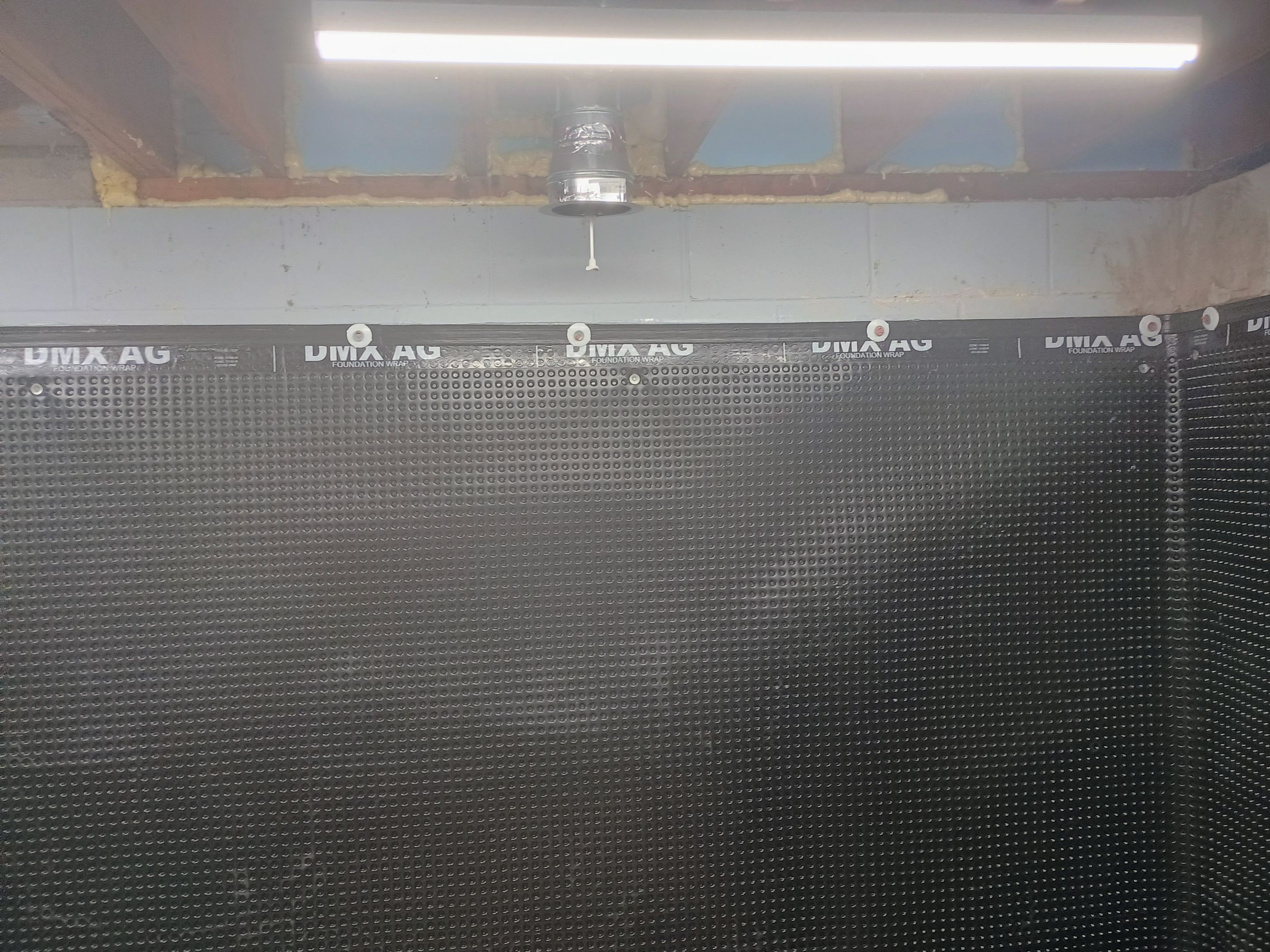 Depressurizing Denny's Basement Wall by Waterproofing Northeast