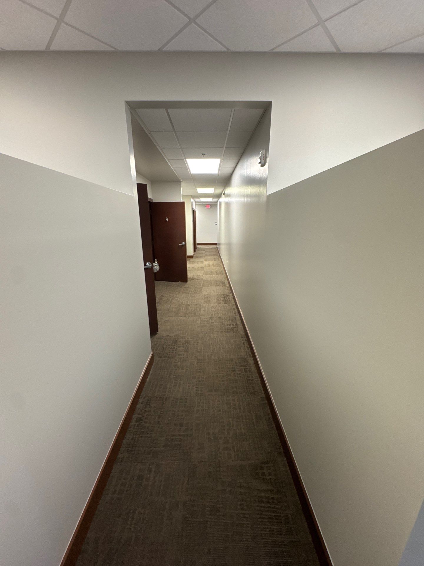 Commercial Office Interior Remodel and Modern Suite Refresh in Sioux Falls by Select Painting, Coatings & Garage Cabinets