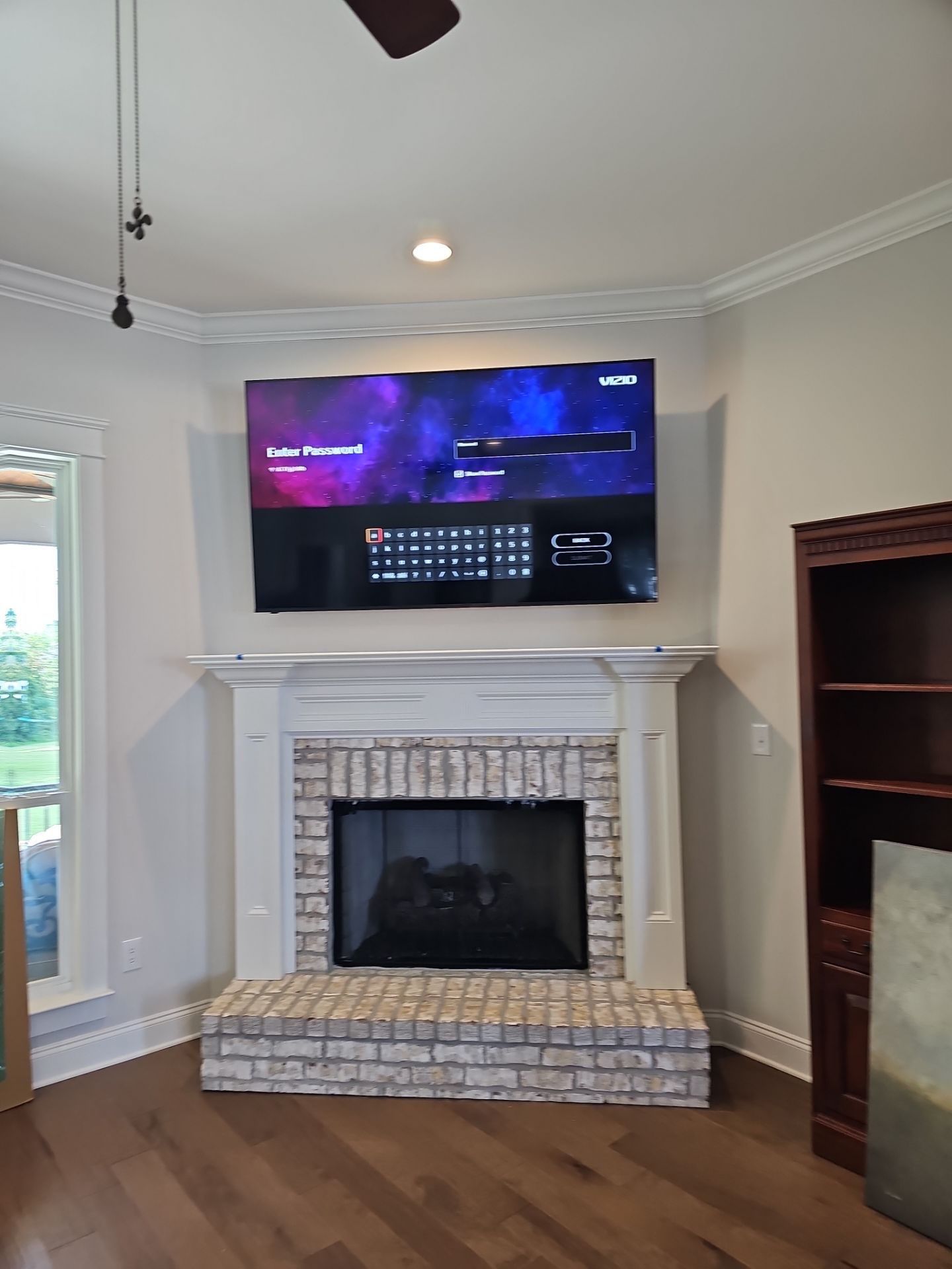 Fireplace TV Mounting Projects by Hangman Mounting & Installation 