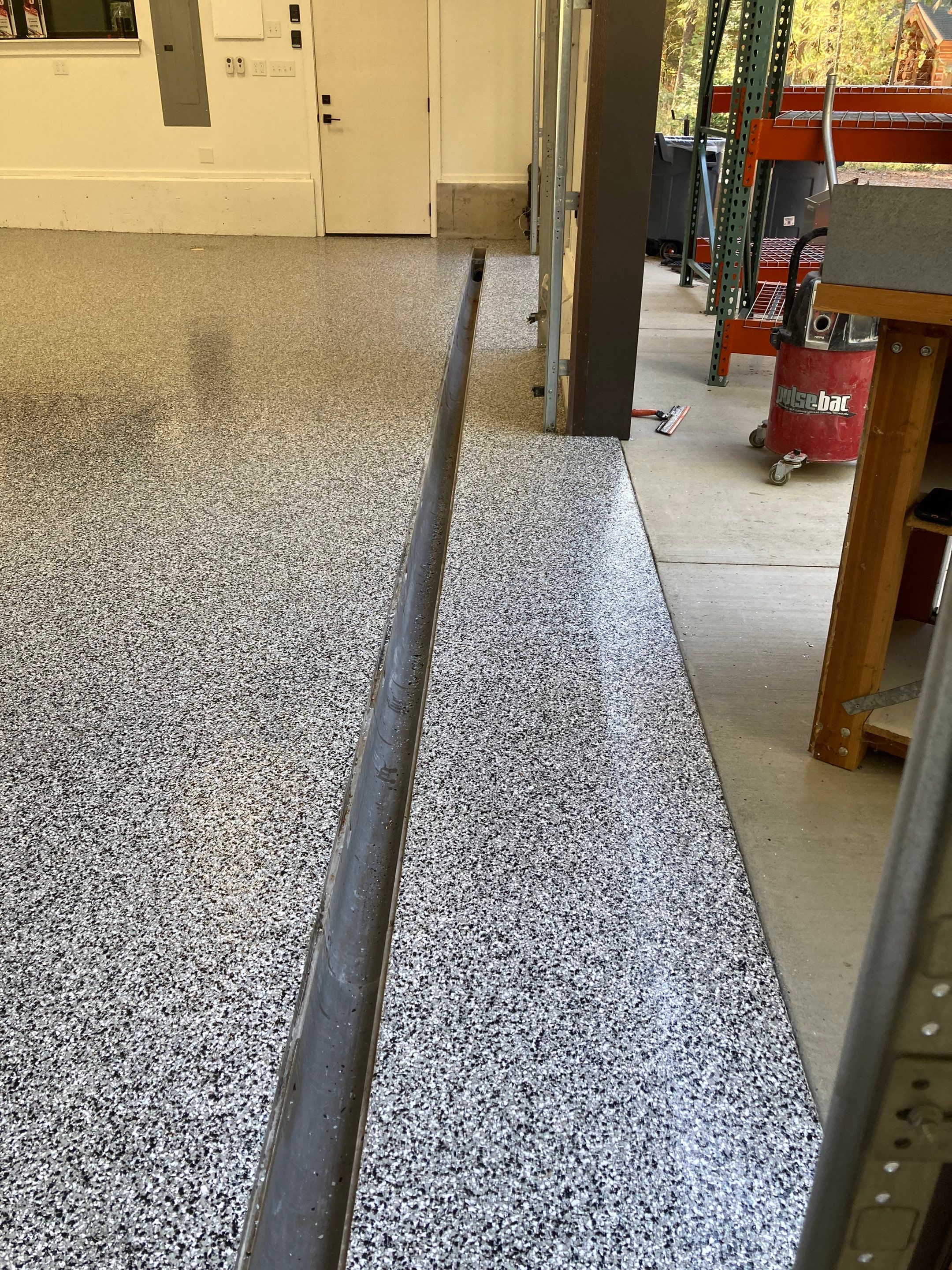 Garage Transformation using Domino and the Penntek Evolution System by Croc Coatings, LLC
