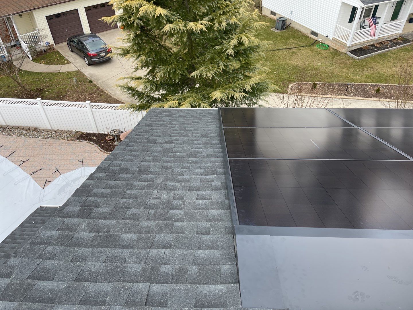 Roof Replacement with GAF Decotech integrated solar panels by American Home Contractors