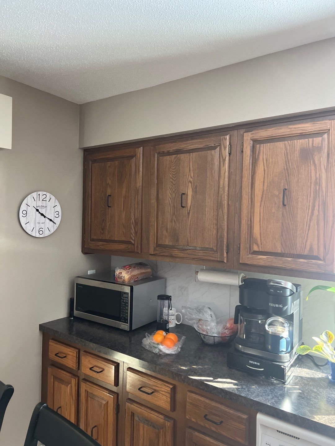 Kitchen Cabinet repaint by Cutting edge painting 