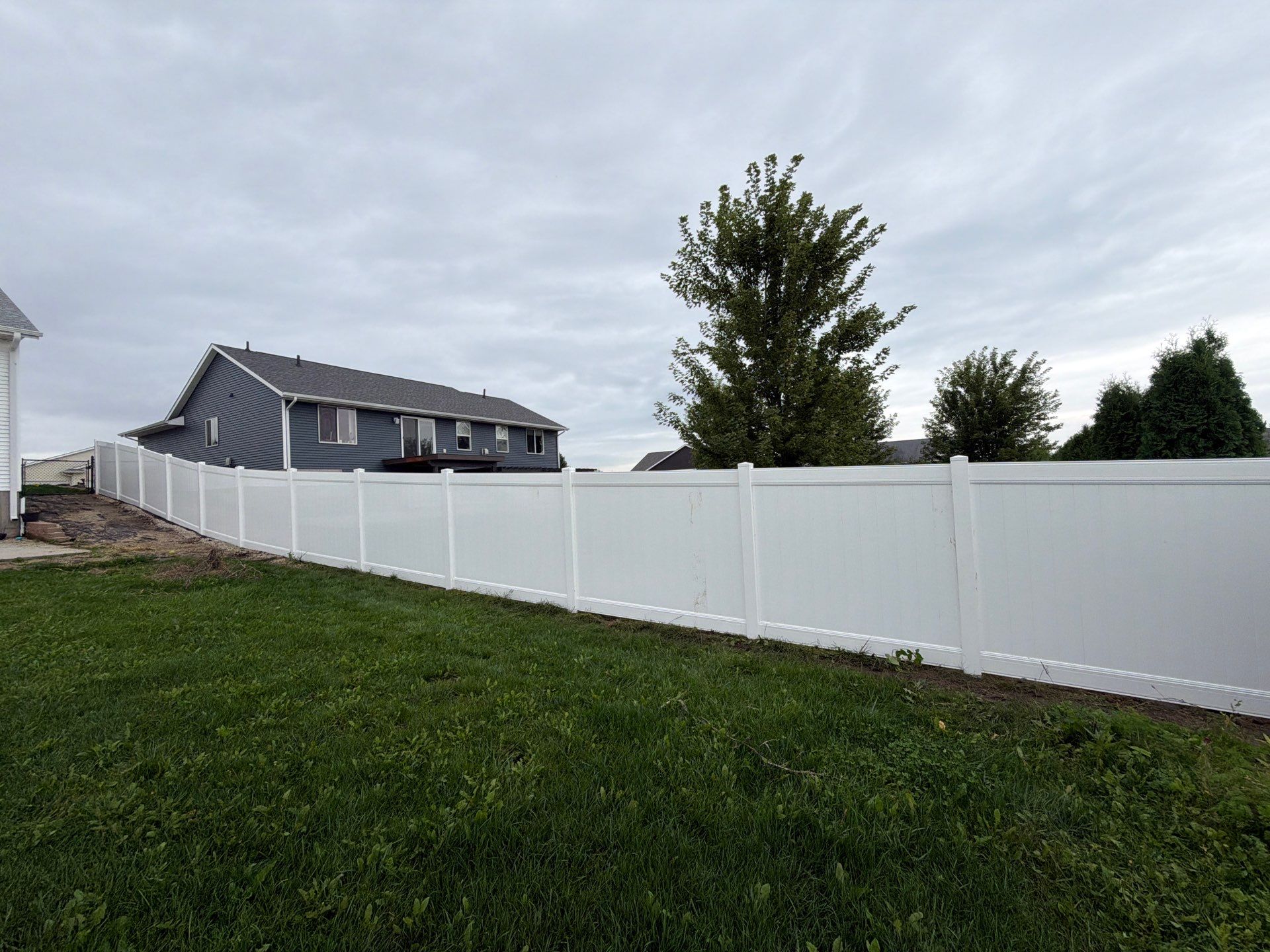 Residential Vinyl Privacy Fence Installation in Urbana by Perfect Picket Fence and Stain
