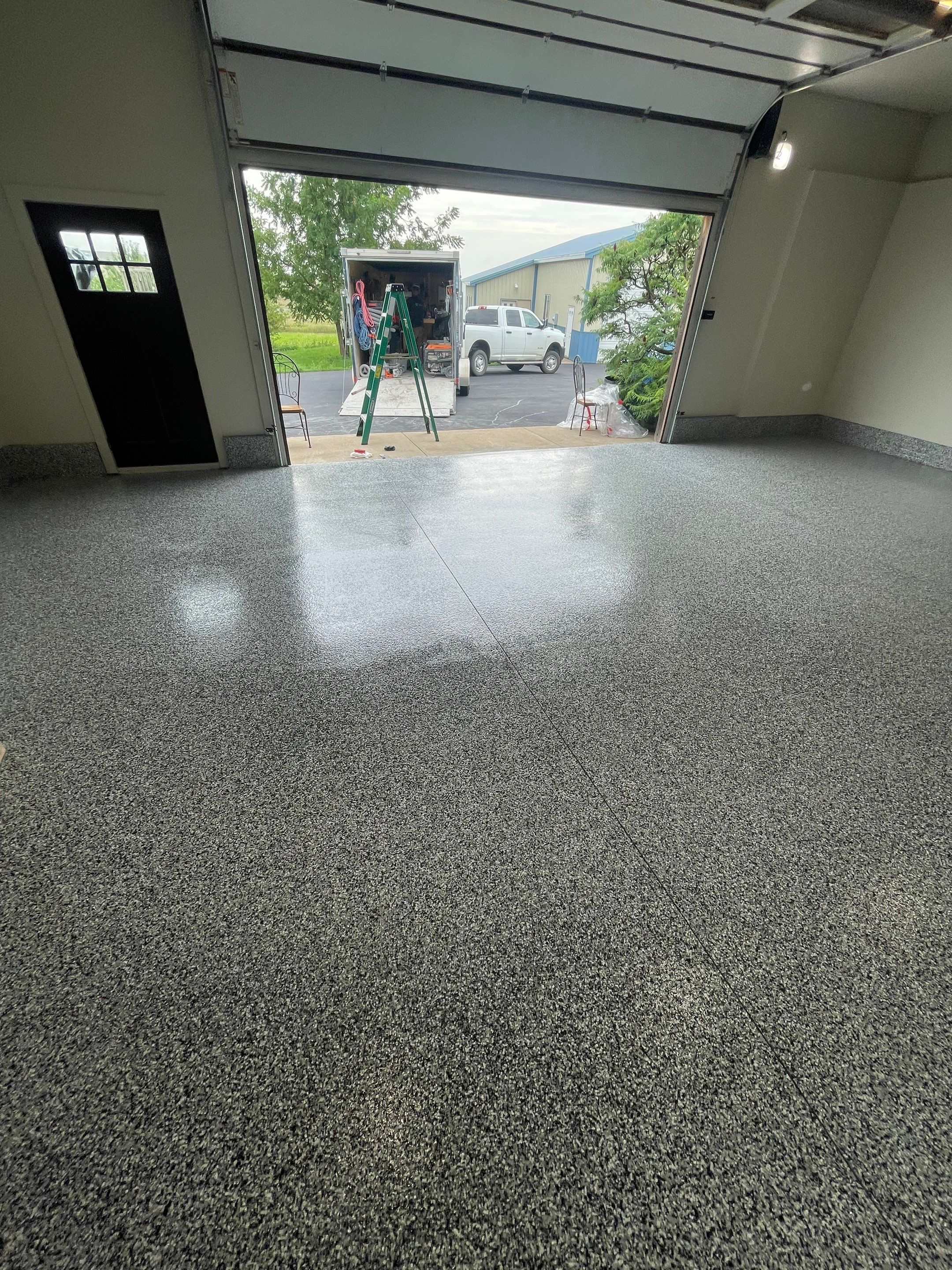 Domino Flake Floor Coating and Crack Repair in Chancellor by Select Painting, Coatings & Garage Cabinets