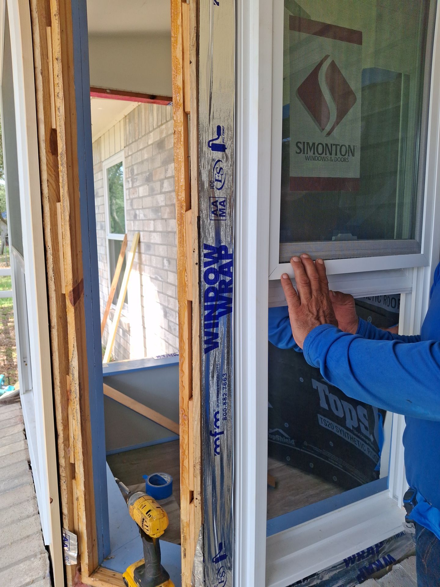 Installing Windows on a Submarine  by Bayfront Roofing and Construction