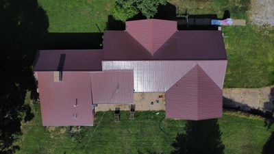 Residential Roofing Install - 29 Gauge G-Rib Metal - Color Brown & Crimson Red