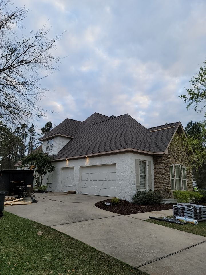Residential Roofing Installation using Roof Replacement by American Roofing & Construction LLC