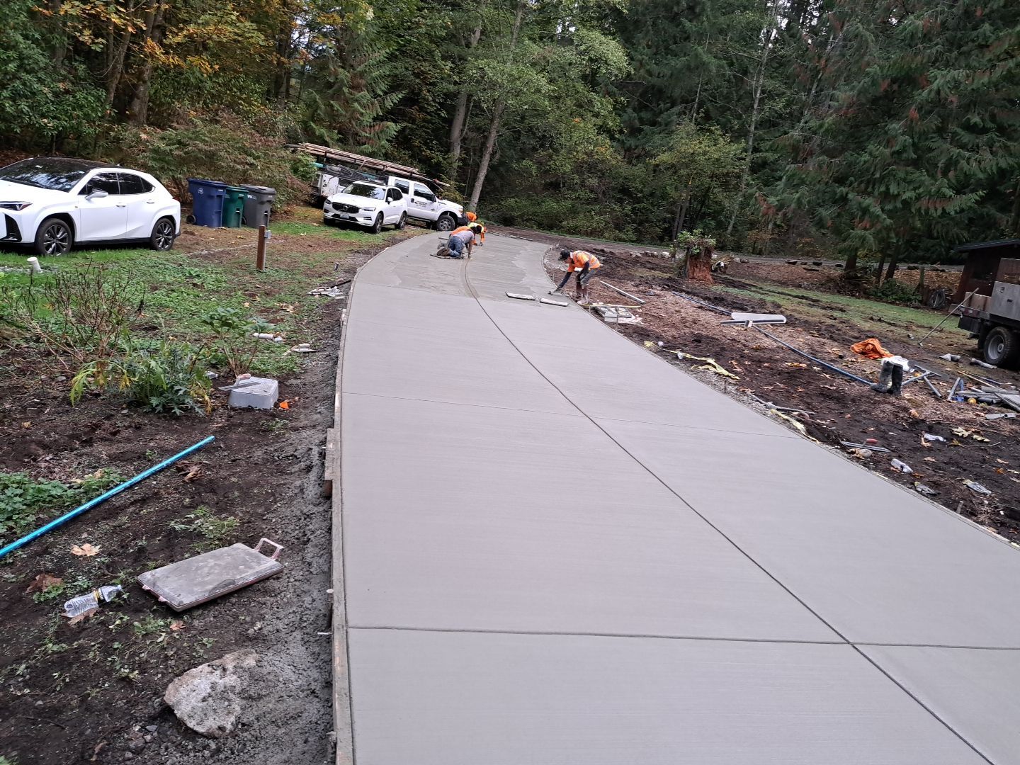Pia | Custom Concrete Driveway, Walkway & Floating Steps by Jireh Asphalt & Concrete Inc 