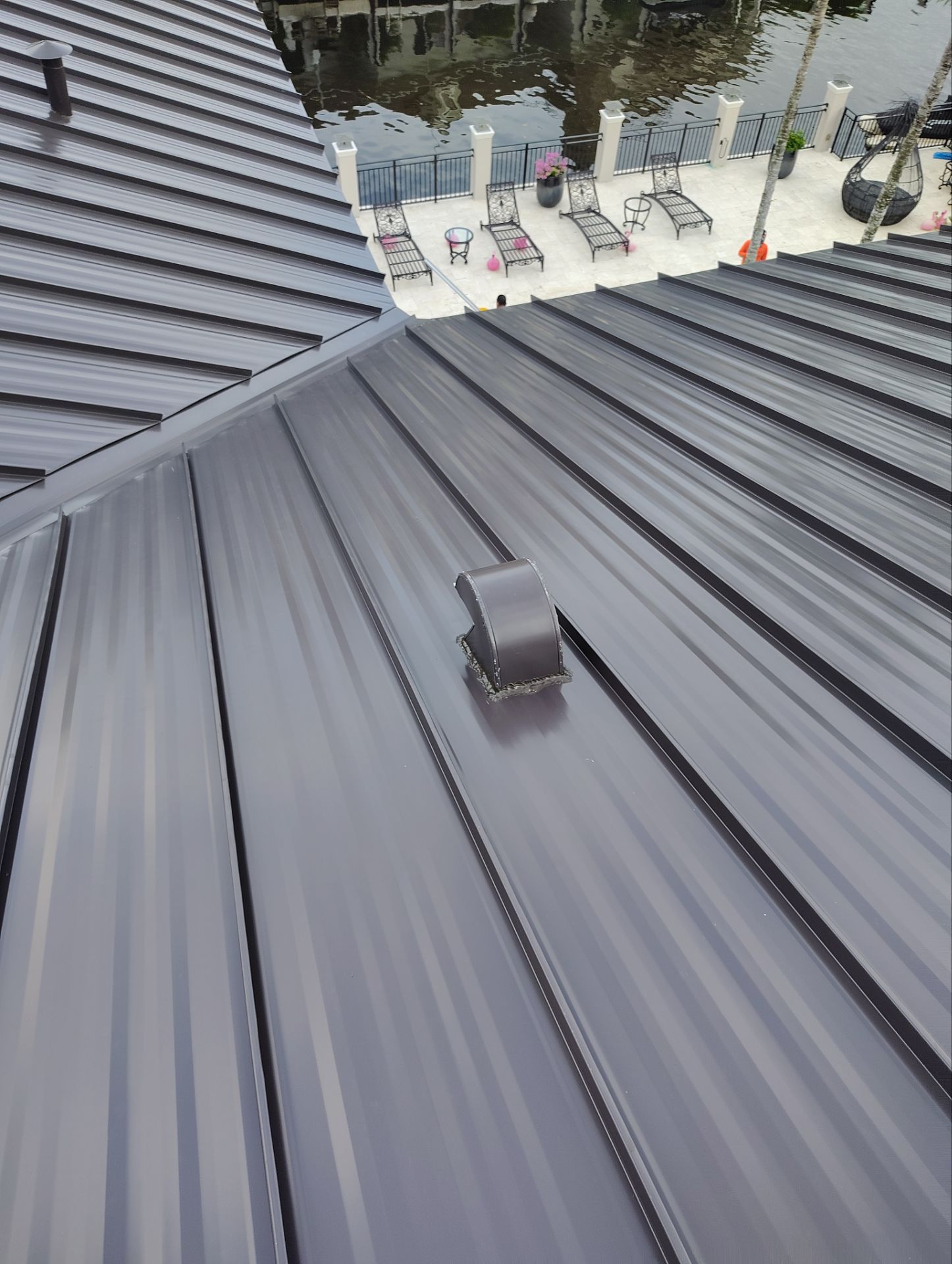 .032 Aluminum 1.5" Mechanical Seam Dark Bronze  by Total Roofing System The Metal Roof Experts