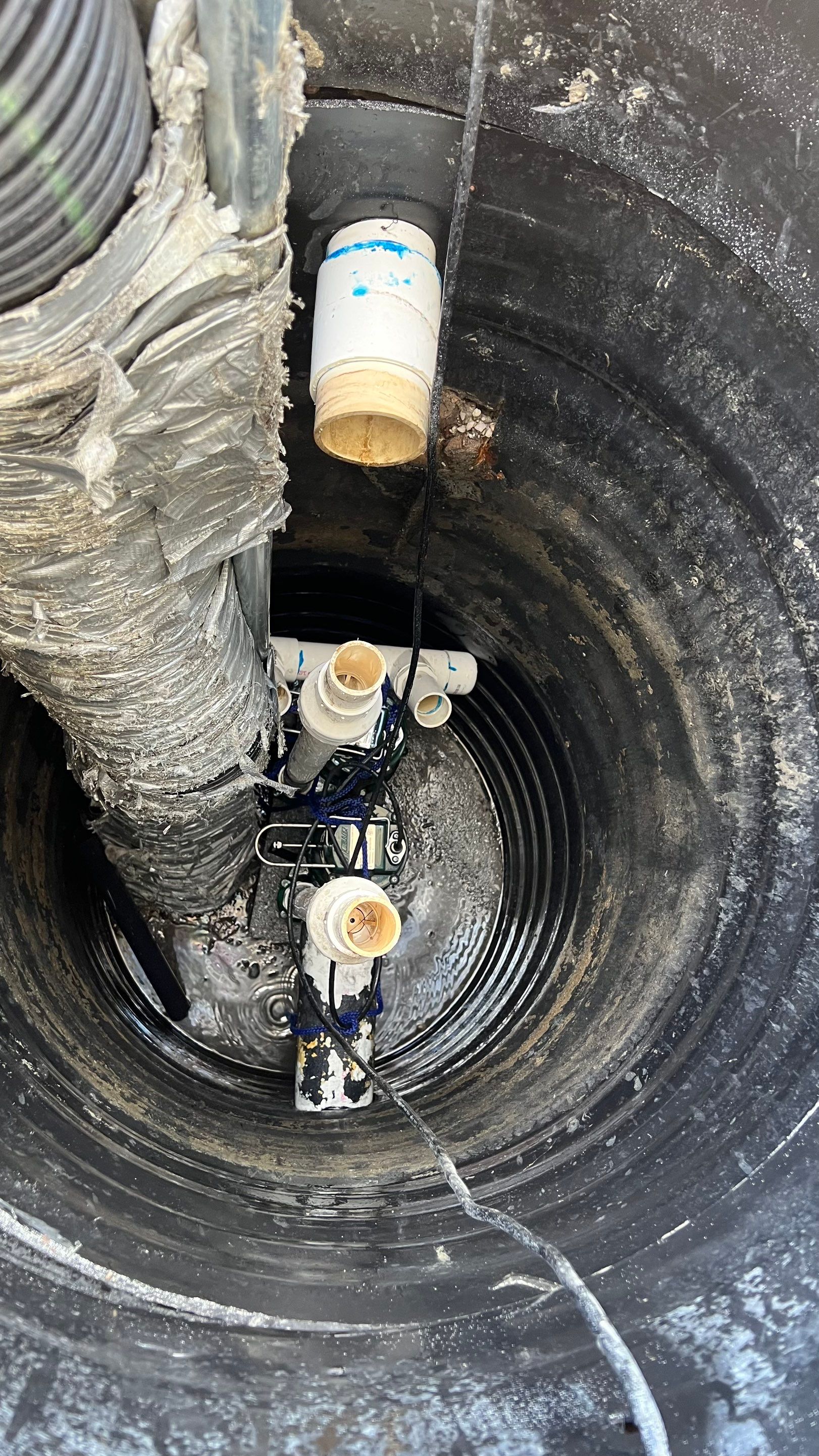 Isles of Capri Condo Parking Garage Drainage System Cleaning by APS Power & Water