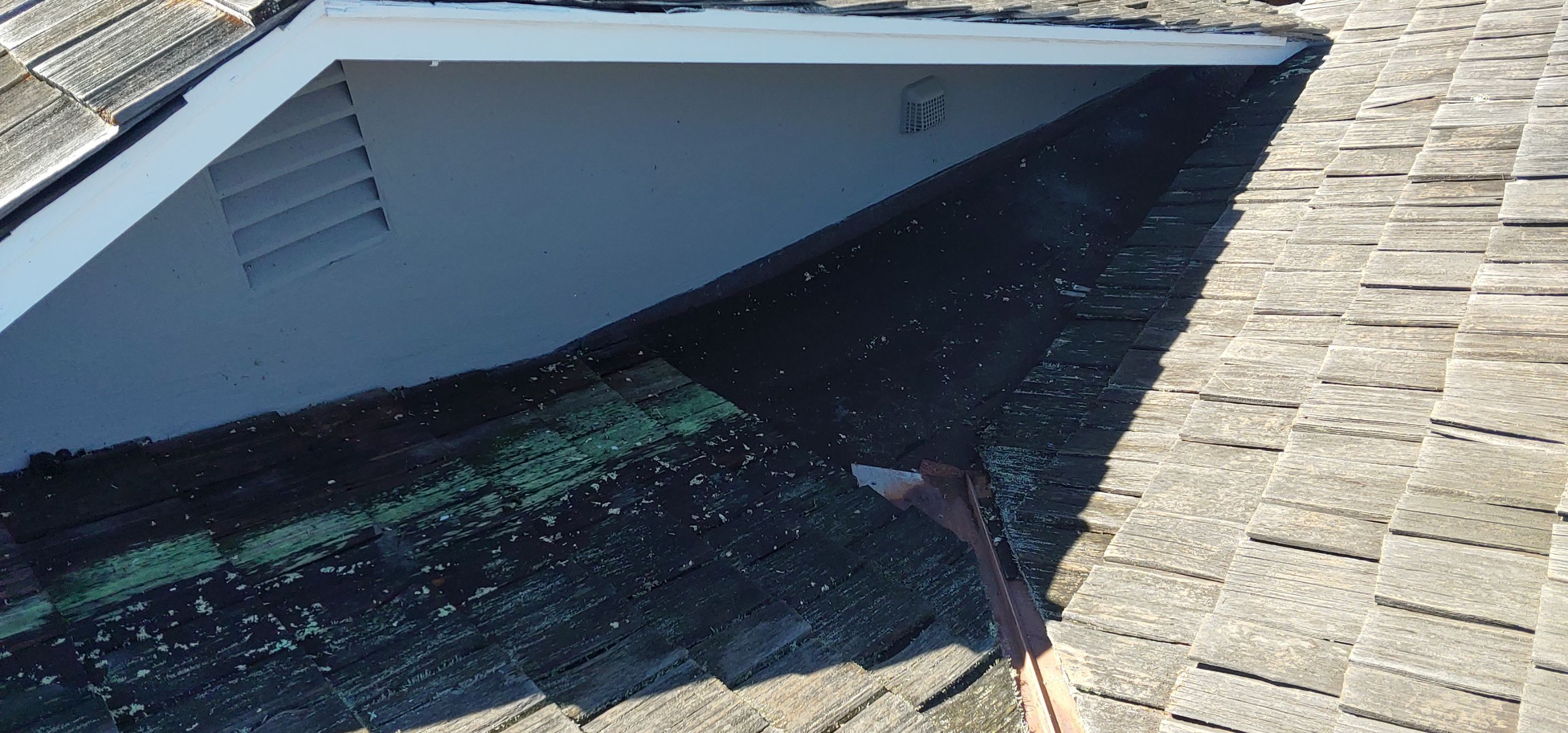 Refurbish and repair shake roof to get ready to sell by Straight Edge Roofing Inc