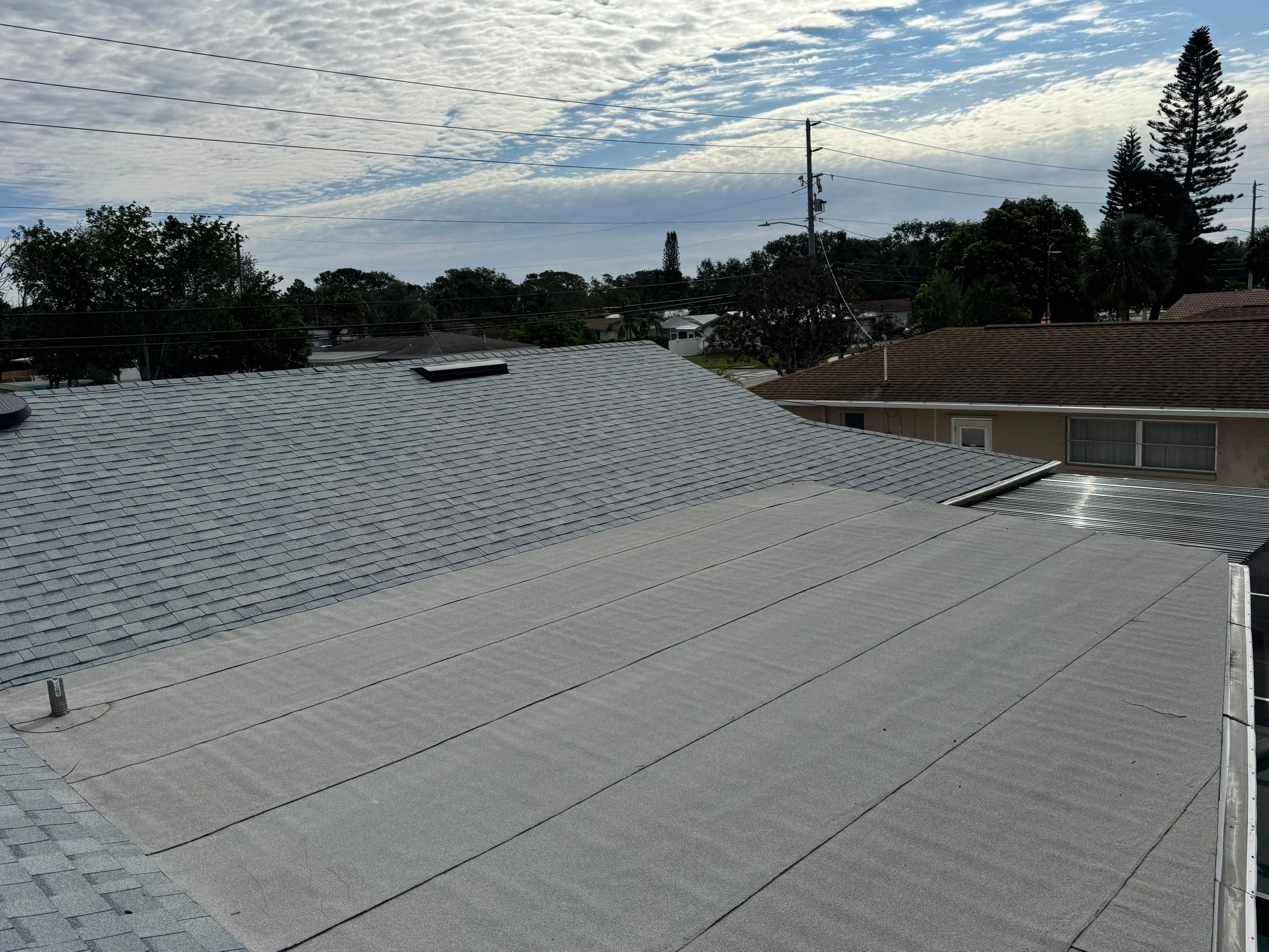 Estate Gray Shingles by Reimagine Roofing