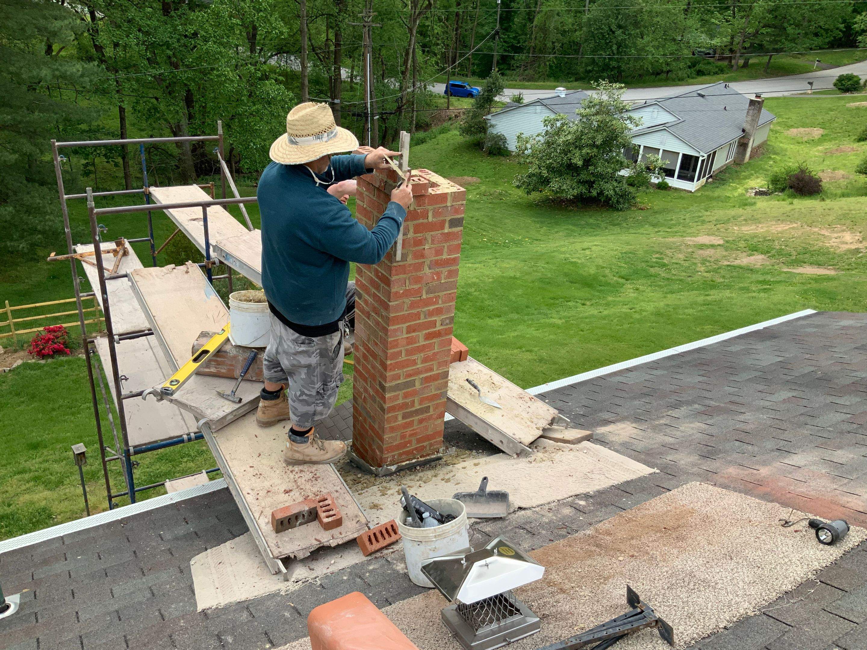 Residential Roofing Installation using Landmark Shingles Color Weatherwood by Alpha Design Services