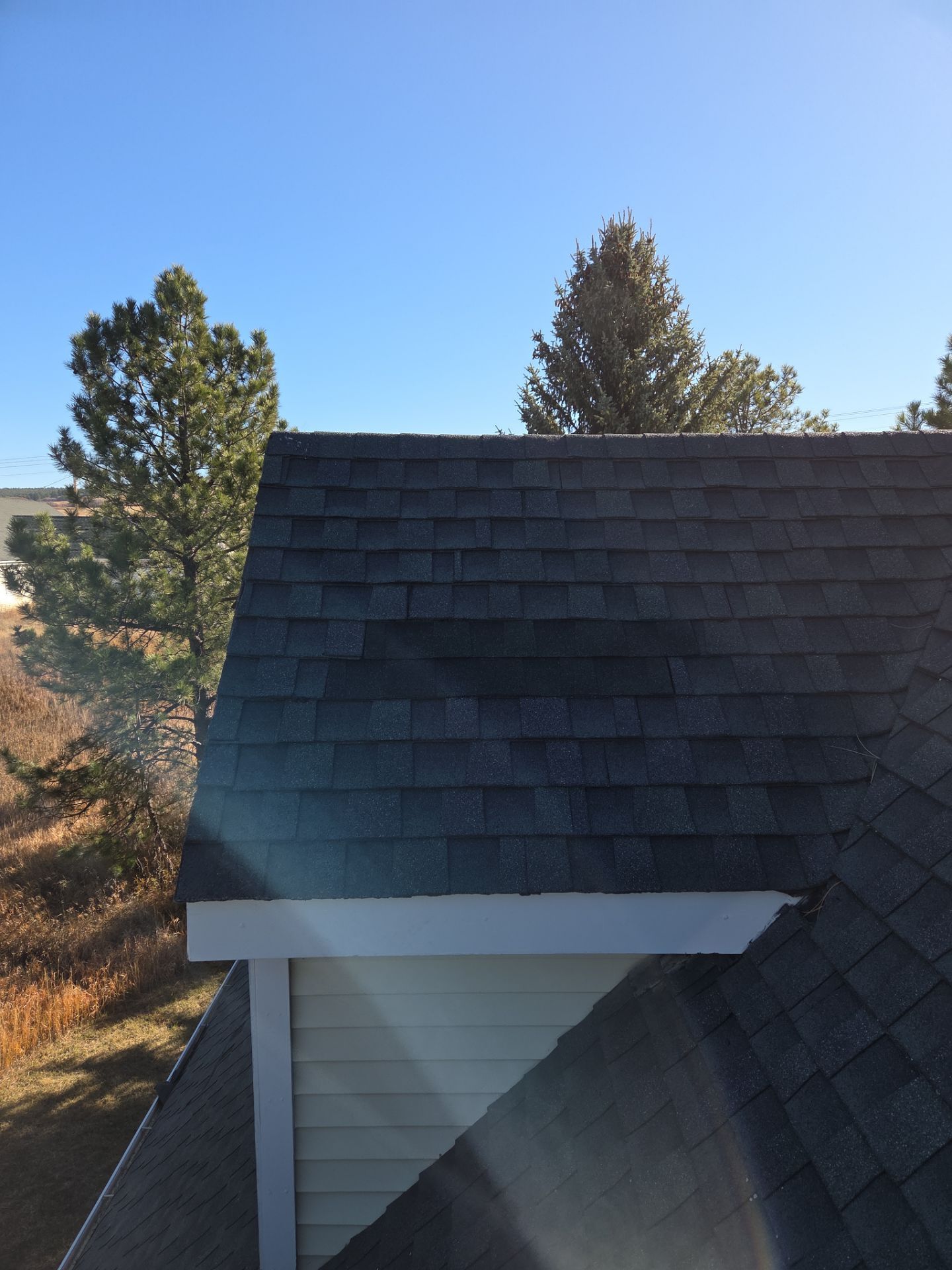  Wind Damage Repair  by RTP Roofing Company