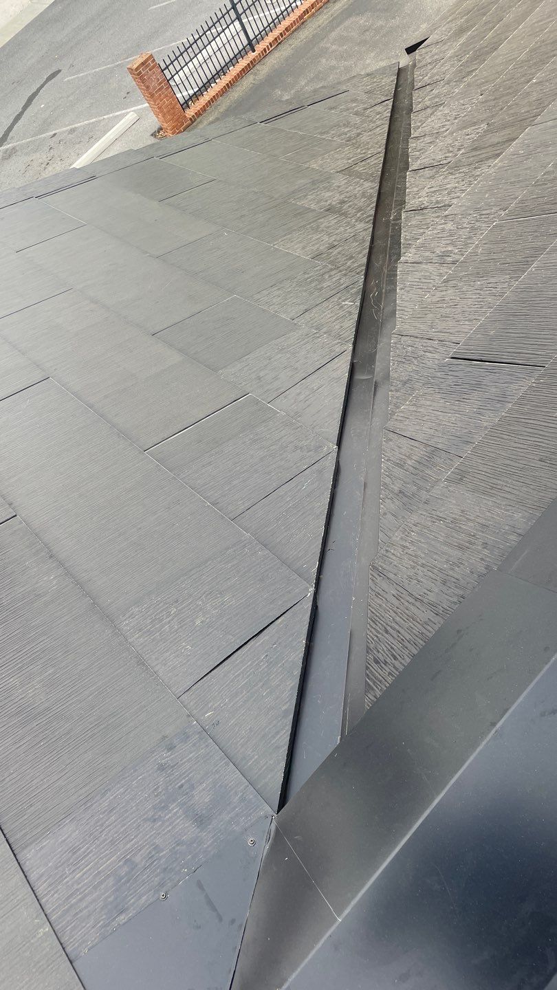 Tesla Solar Roof on a Commercial Building by American Home Contractors