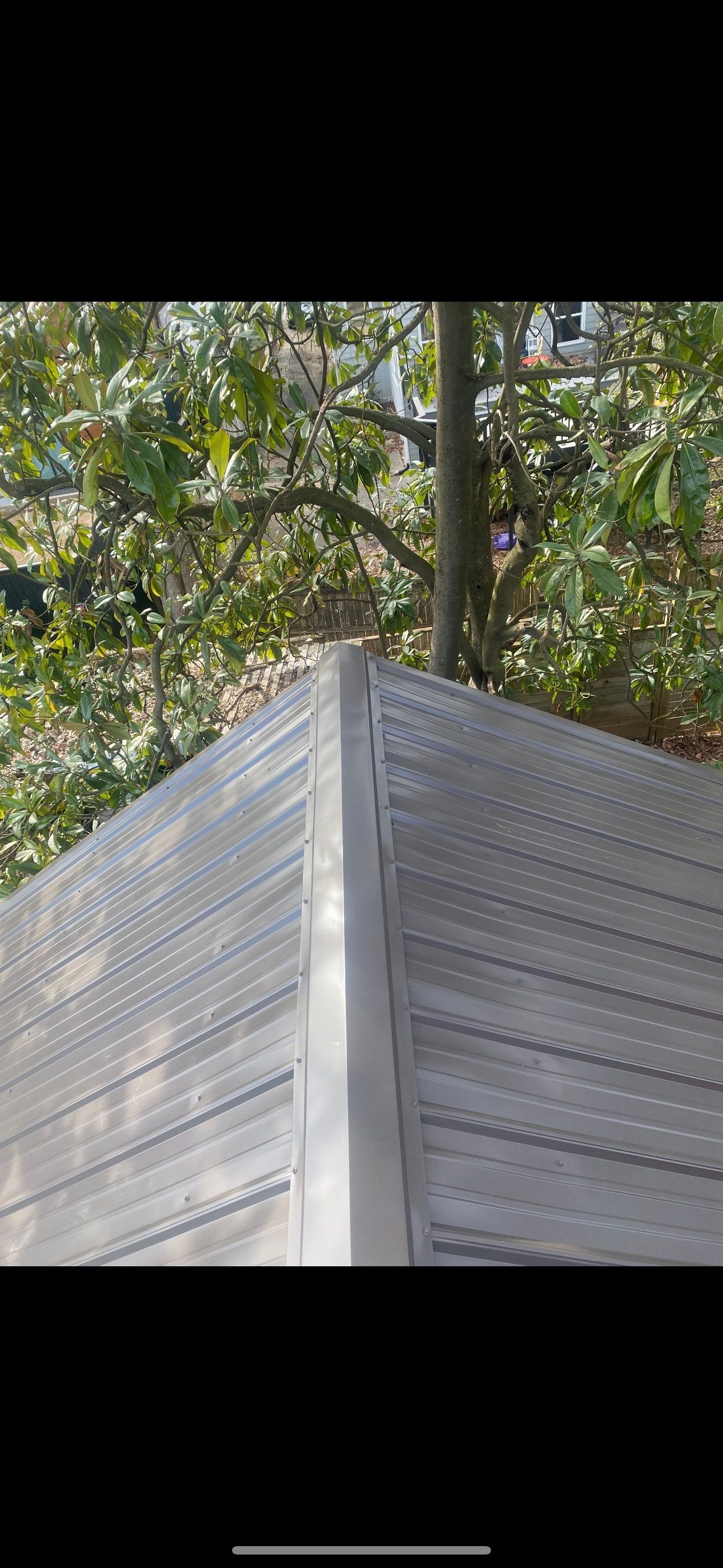 metal roof install by Nailed It Roofing & Remodeling LLC