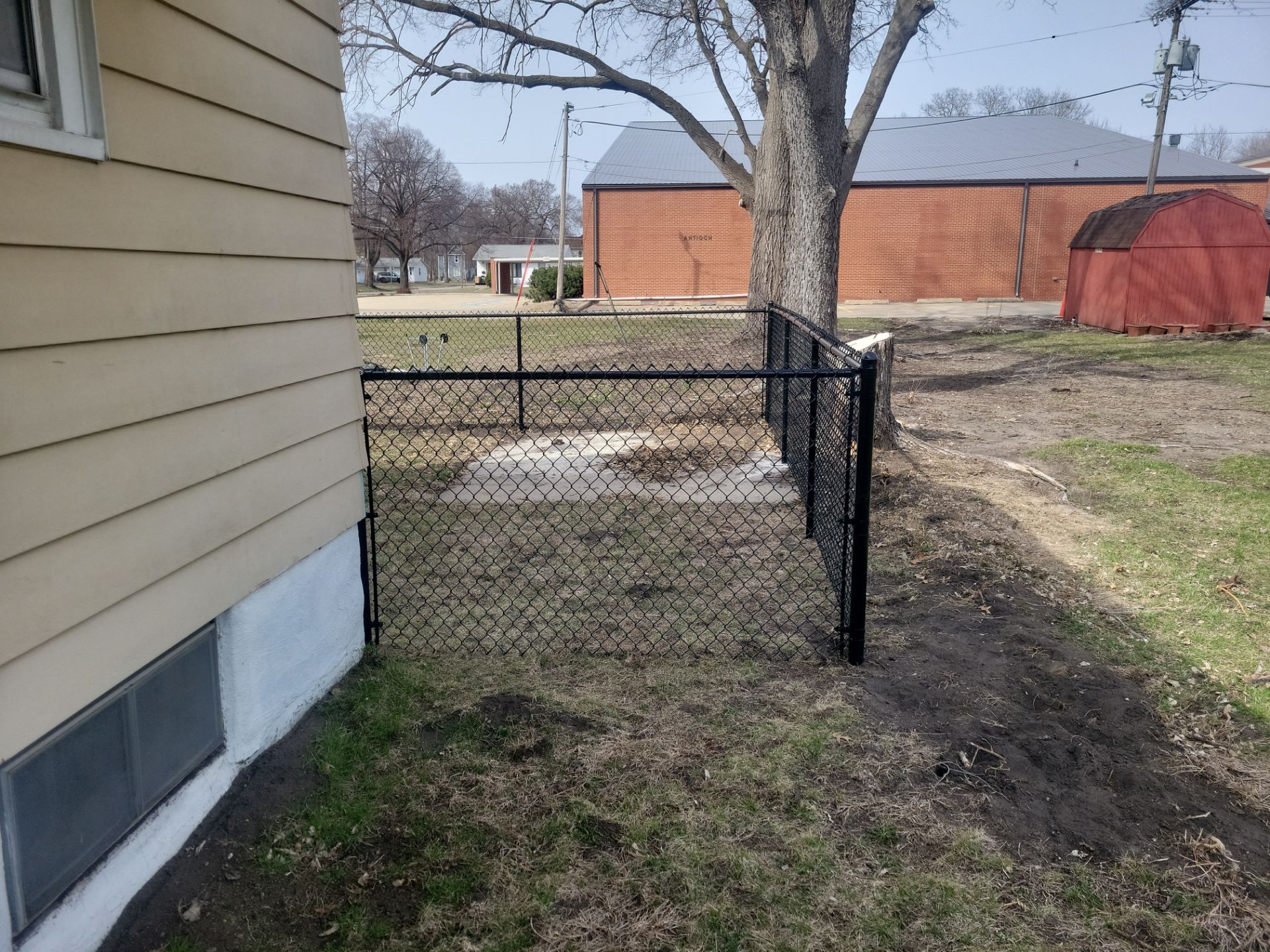 Black Chain Link Fence and Gate Installation in Waterloo by Perfect Picket Fence and Stain