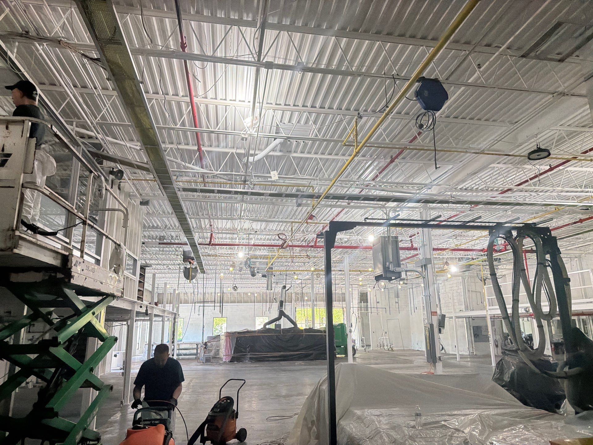 Industrial Warehouse Fire Damage Cleaning and Spray Sealing in Islandia by EMS Restoration Corp