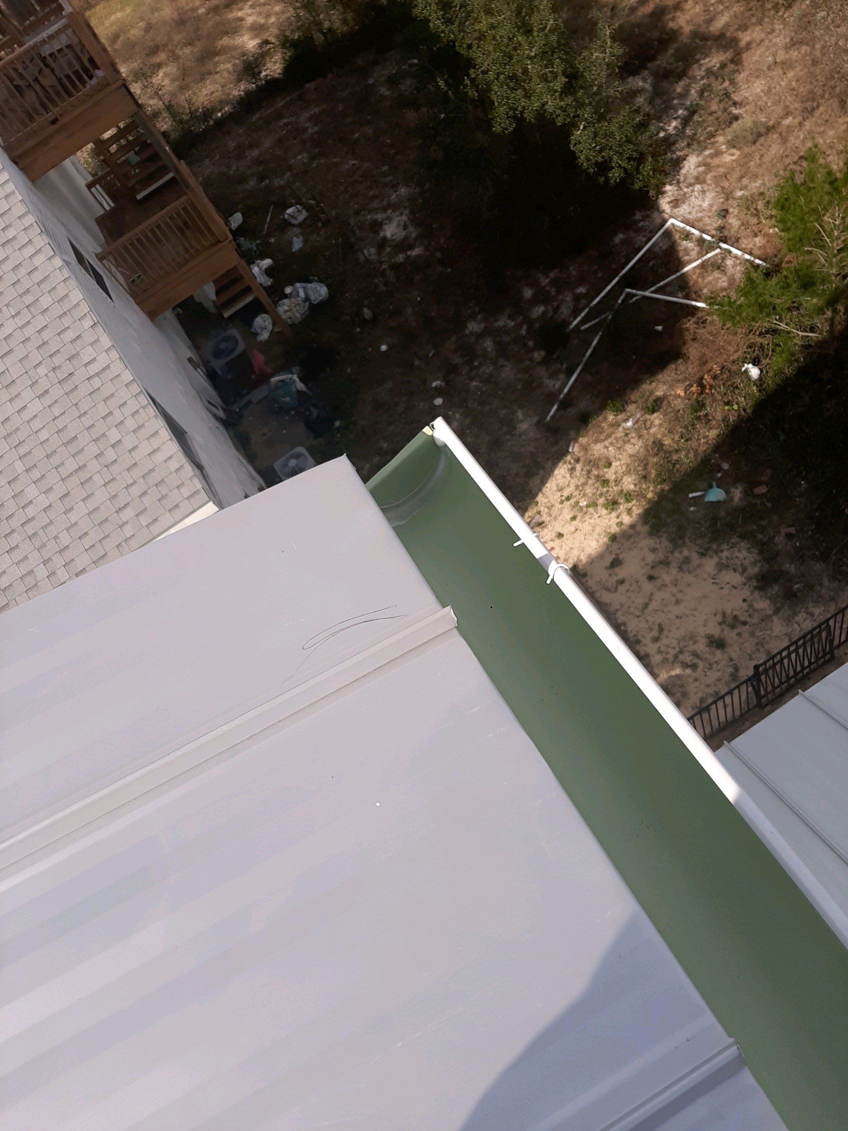 Gutter Installation Using 6 Inch Seamless Aluminum Gutters by Gutter Professors