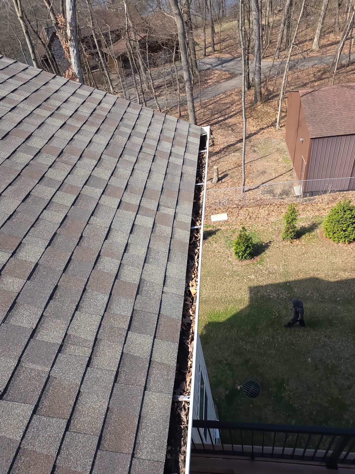 Commercial gutter cleaning Ann Arbor, MI before photo with filled gutters