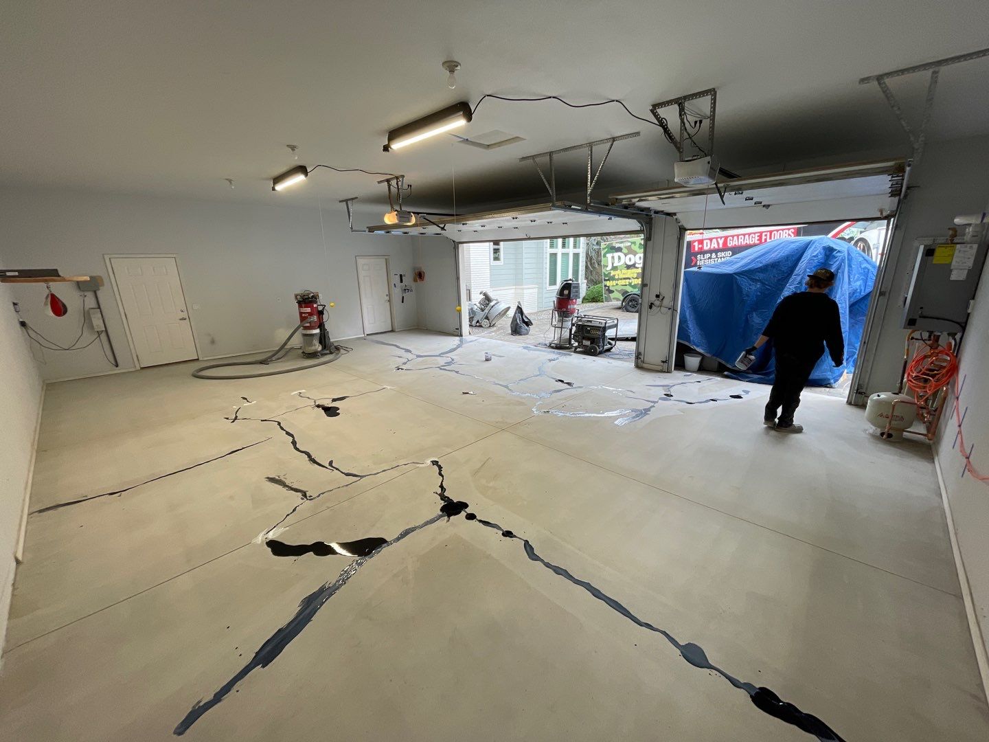 Garage Transformation using Canfield Hybrid & Grey Croc Cabinets by Croc Coatings, LLC