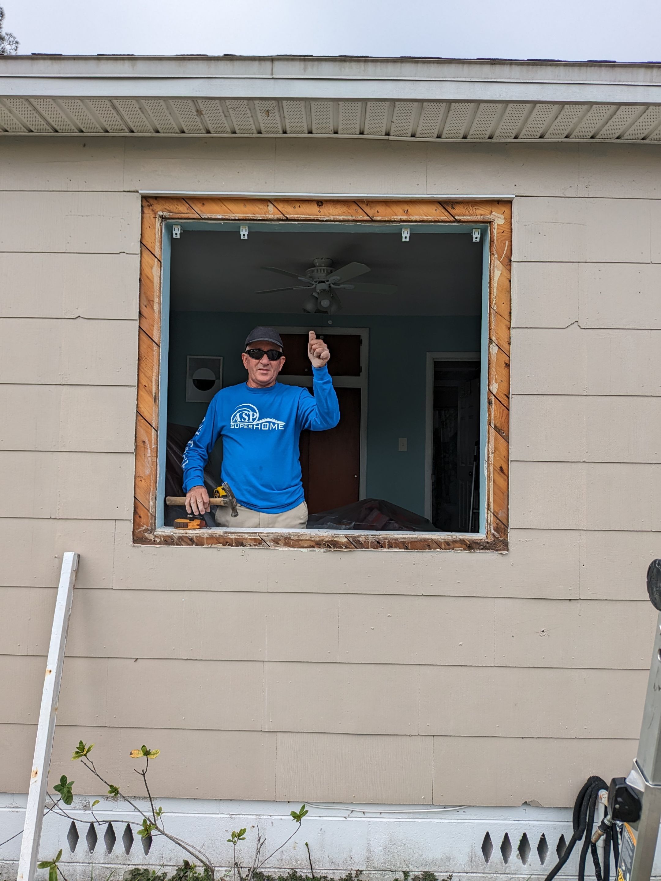 Wood Frame House / Fin Window Install using Vinyl PGT Fin Frame Windows by ASP SuperHome