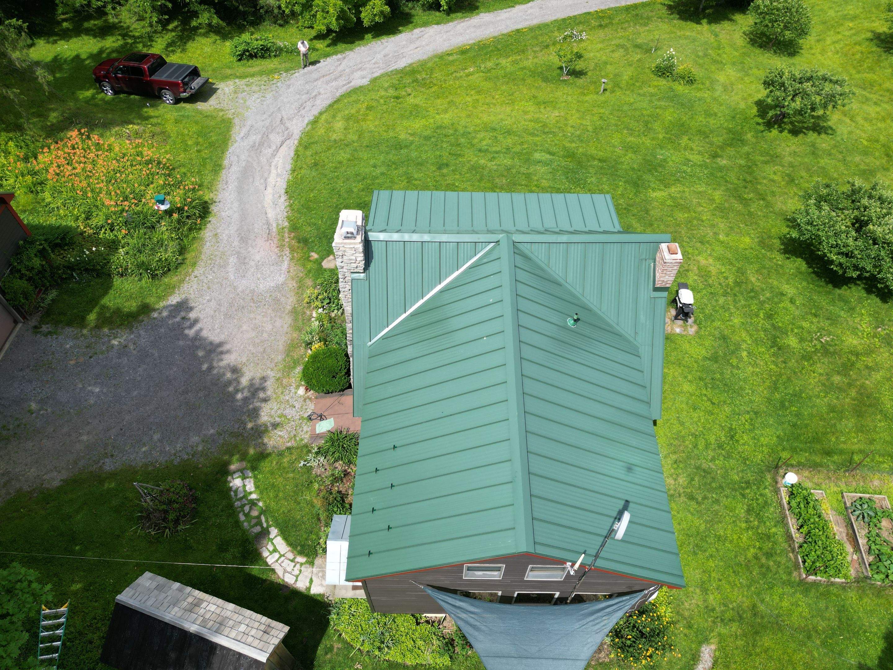 Residential Roofing Installation using Standing Seam  by Goldspire
