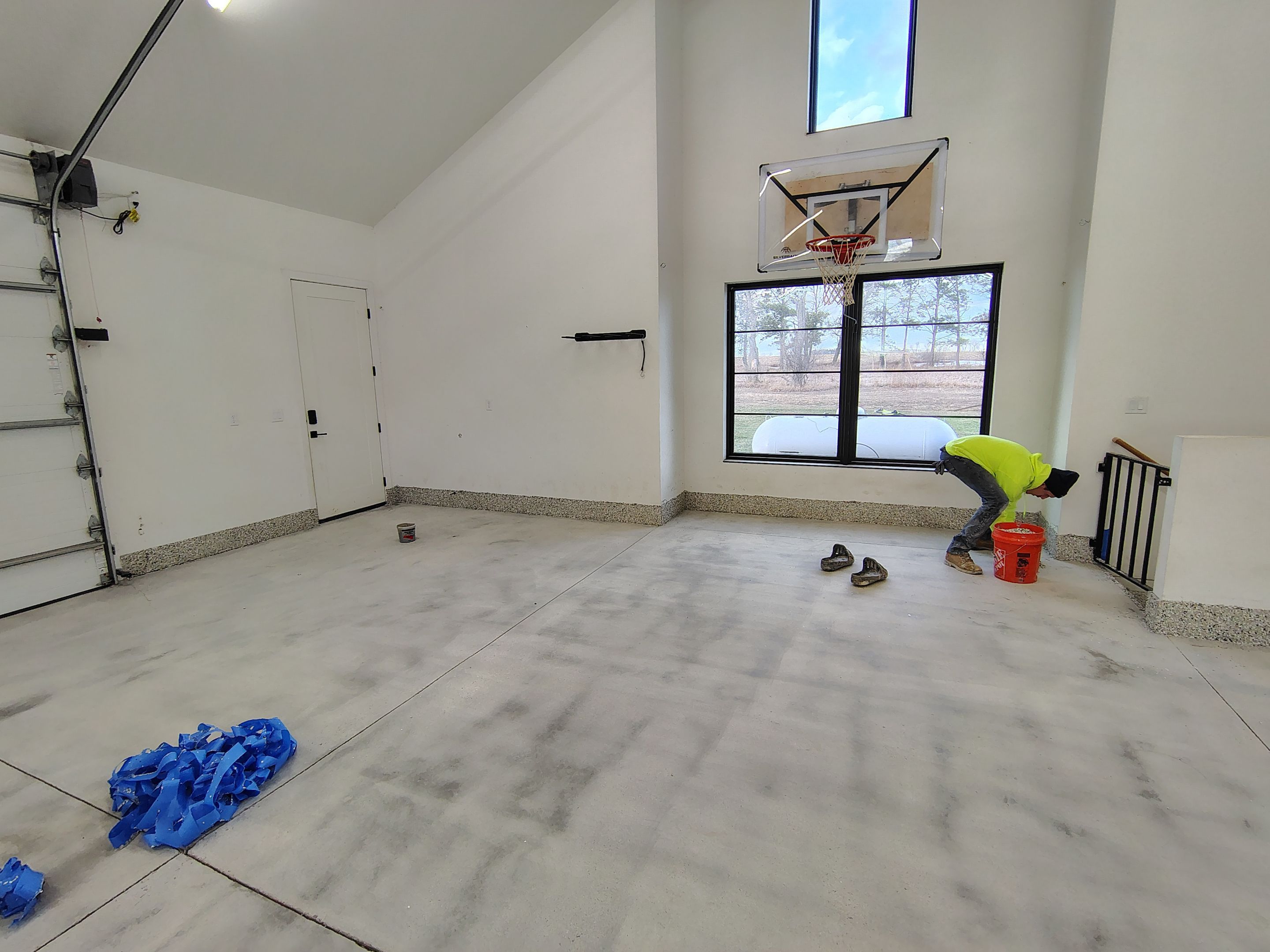 Epoxy Flake Garage Floor and Stair Coating in Sioux Falls by Select Painting, Coatings & Garage Cabinets
