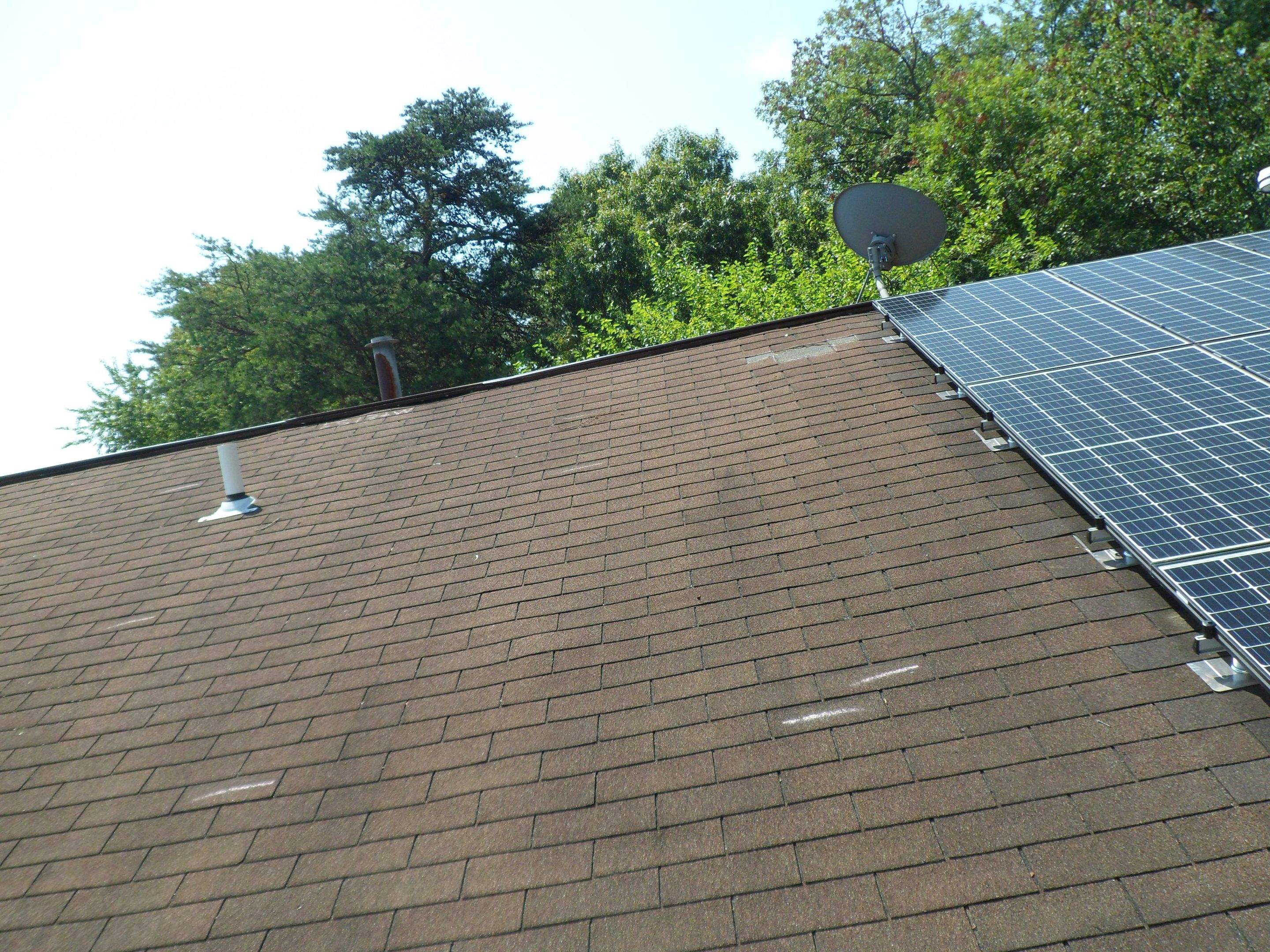 Residential Roofing Installation using Landmark Shingles Color Weatherwood by Alpha Design Services