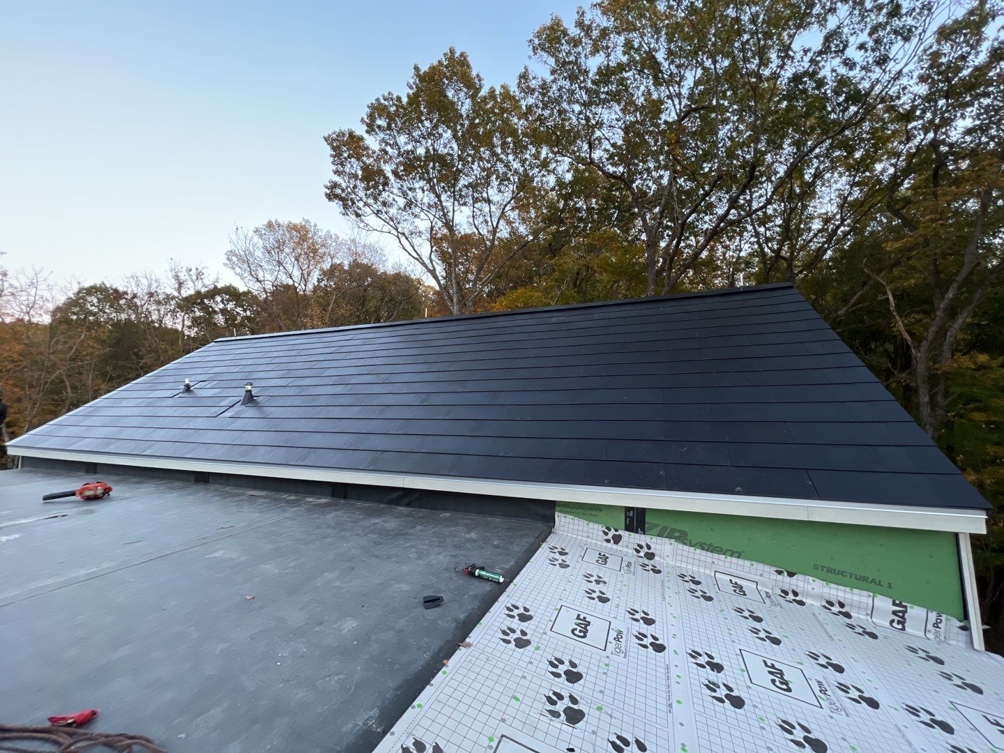 Roof Installation using Tesla Solar Roof V3 by American Home Contractors