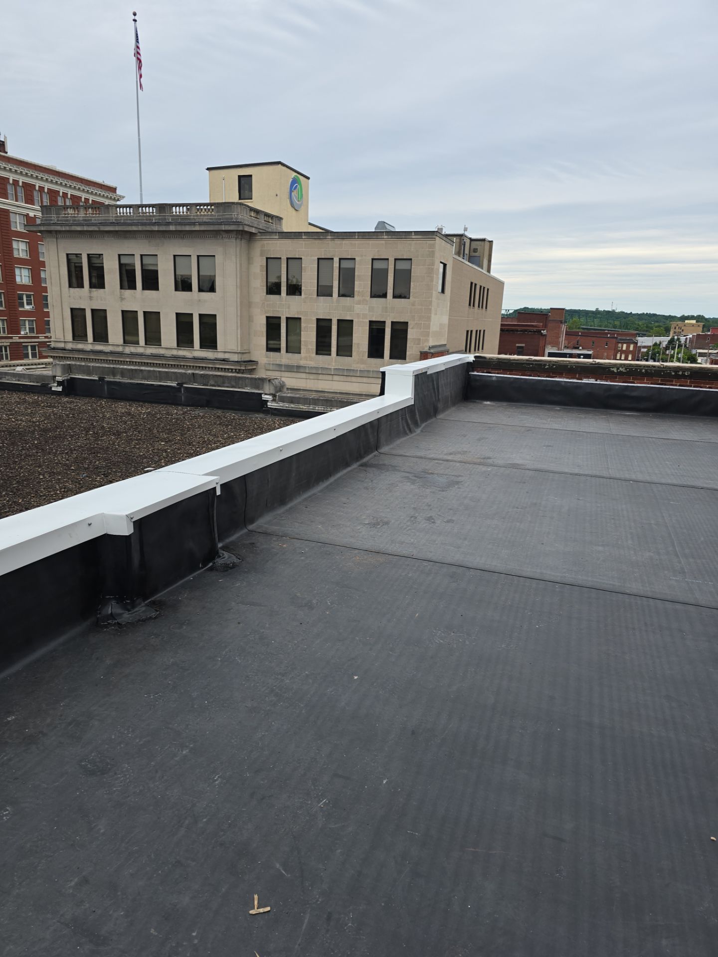 Commercial Roofing Installation using EPDM  by Rainstoppers Roofing