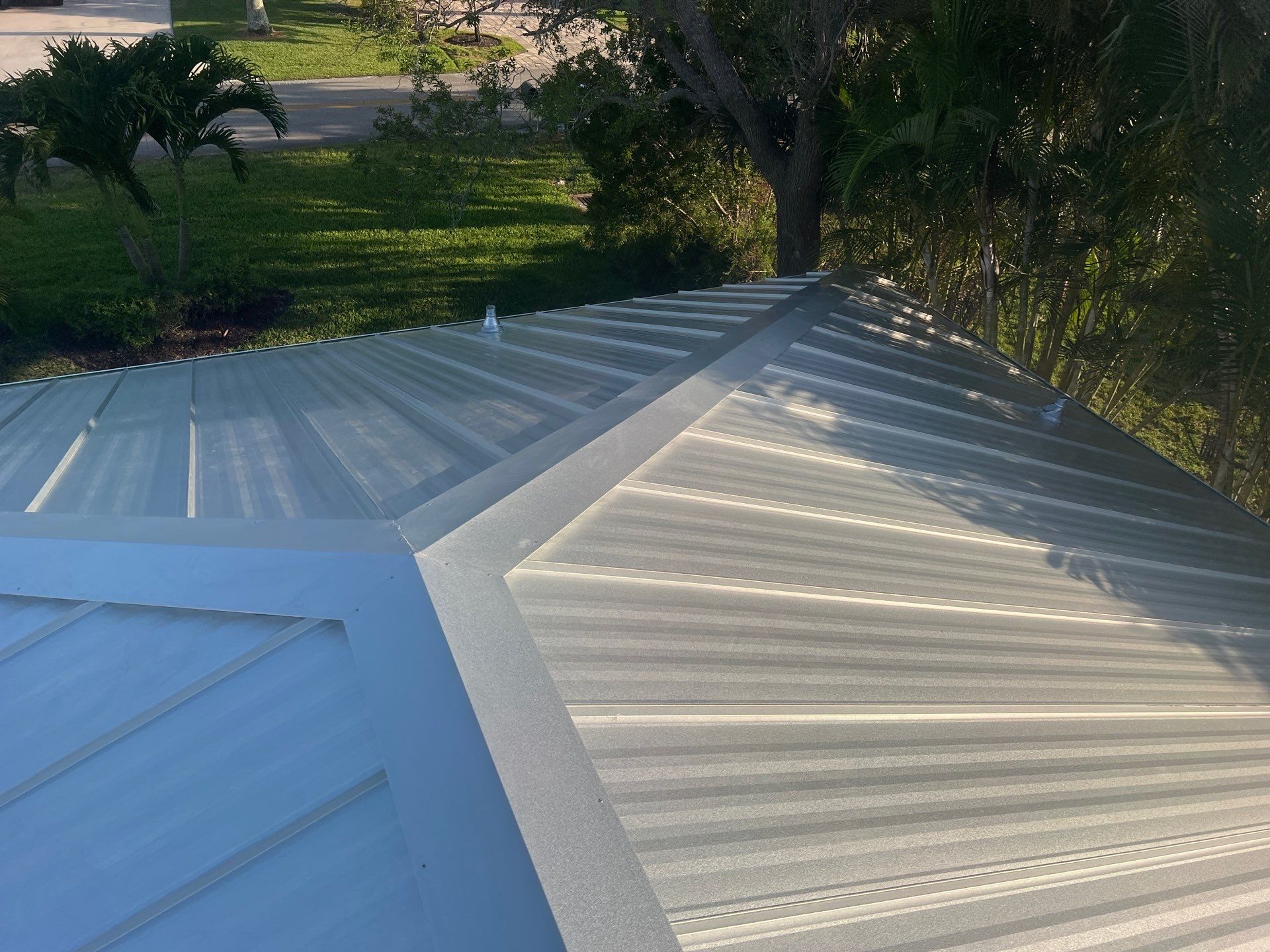 Residential Roofing Installation using Galvalume Standing Seam by Durabilis Roofing INC