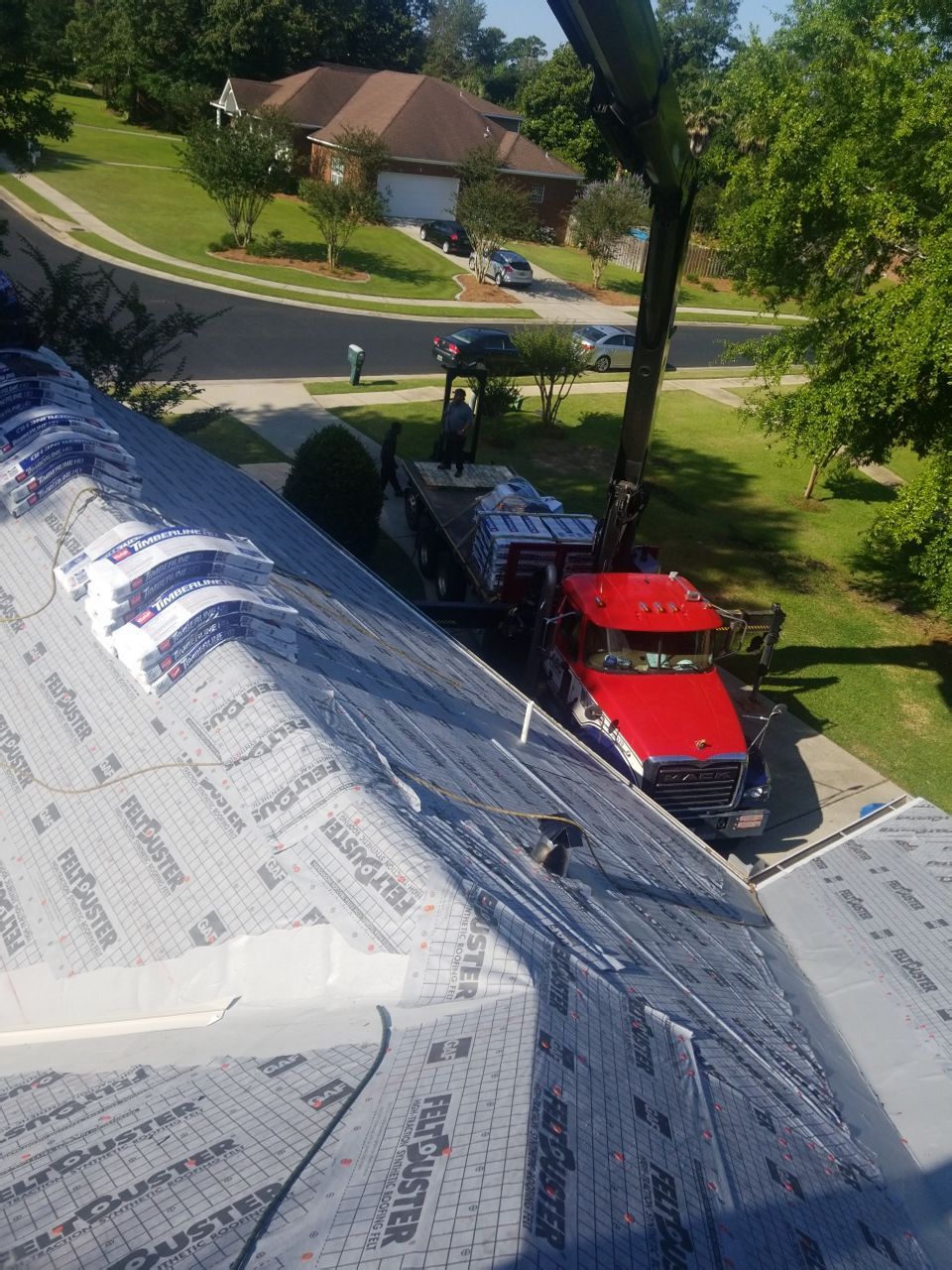 Residential Roofing Installation using Roof Replacement by American Roofing & Construction LLC