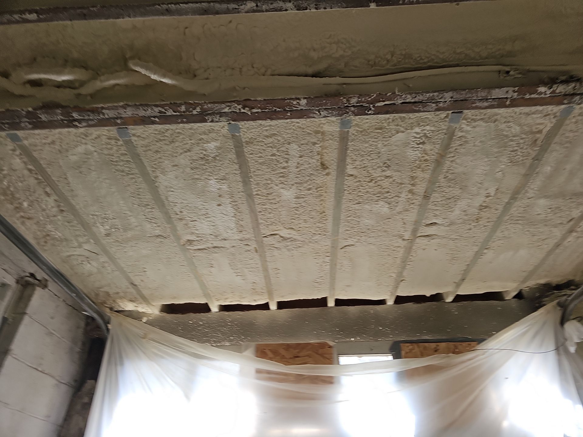 Basement Exterior Walls using Closed Cell Spray Foam by NYS Foam & Energy