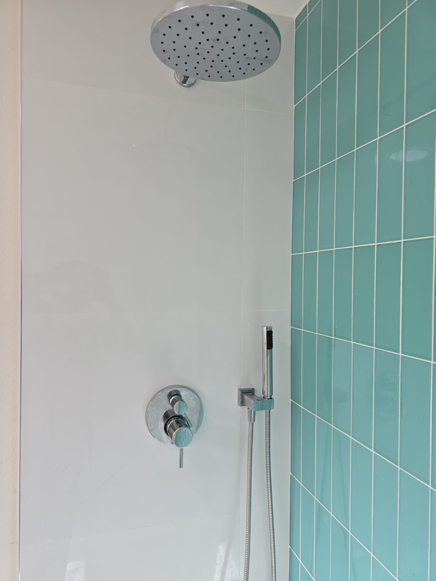 Scope of Work: Installation of Shower, Toilet, Sink, Fixtures, Pipes, and Seals by Us Plumbing
