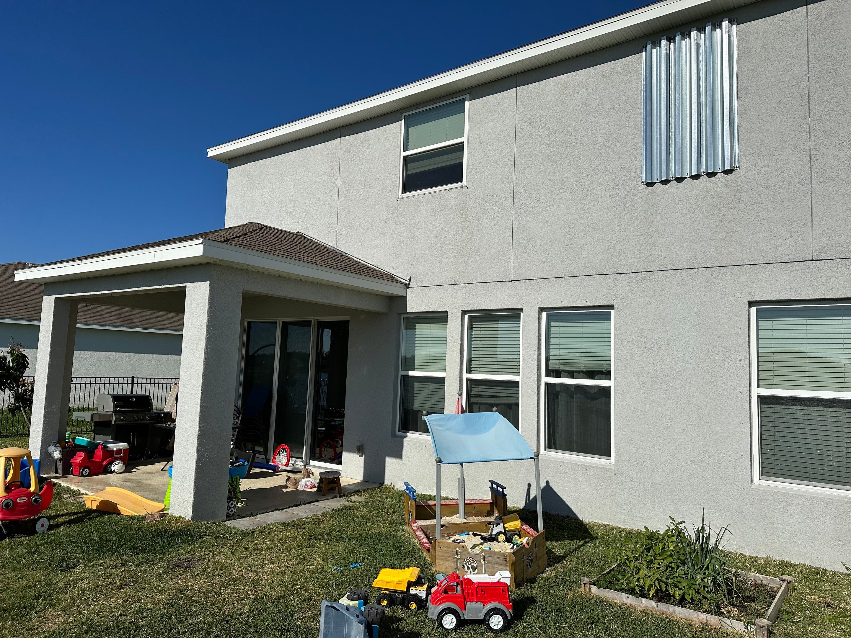 2-Story House Wash & Paver Driveway Cleaning in Trevesta Community, Palmetto, FL | Sunshine AquaWash by Sunshine AquaWash