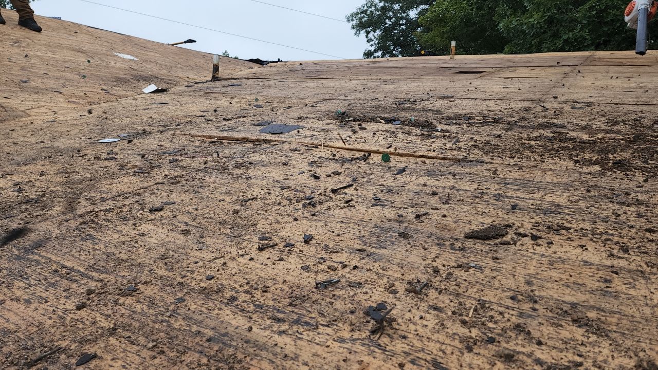Residential Roofing Installation using 60 mil rubber roof  by Nitro Roofing and Construction