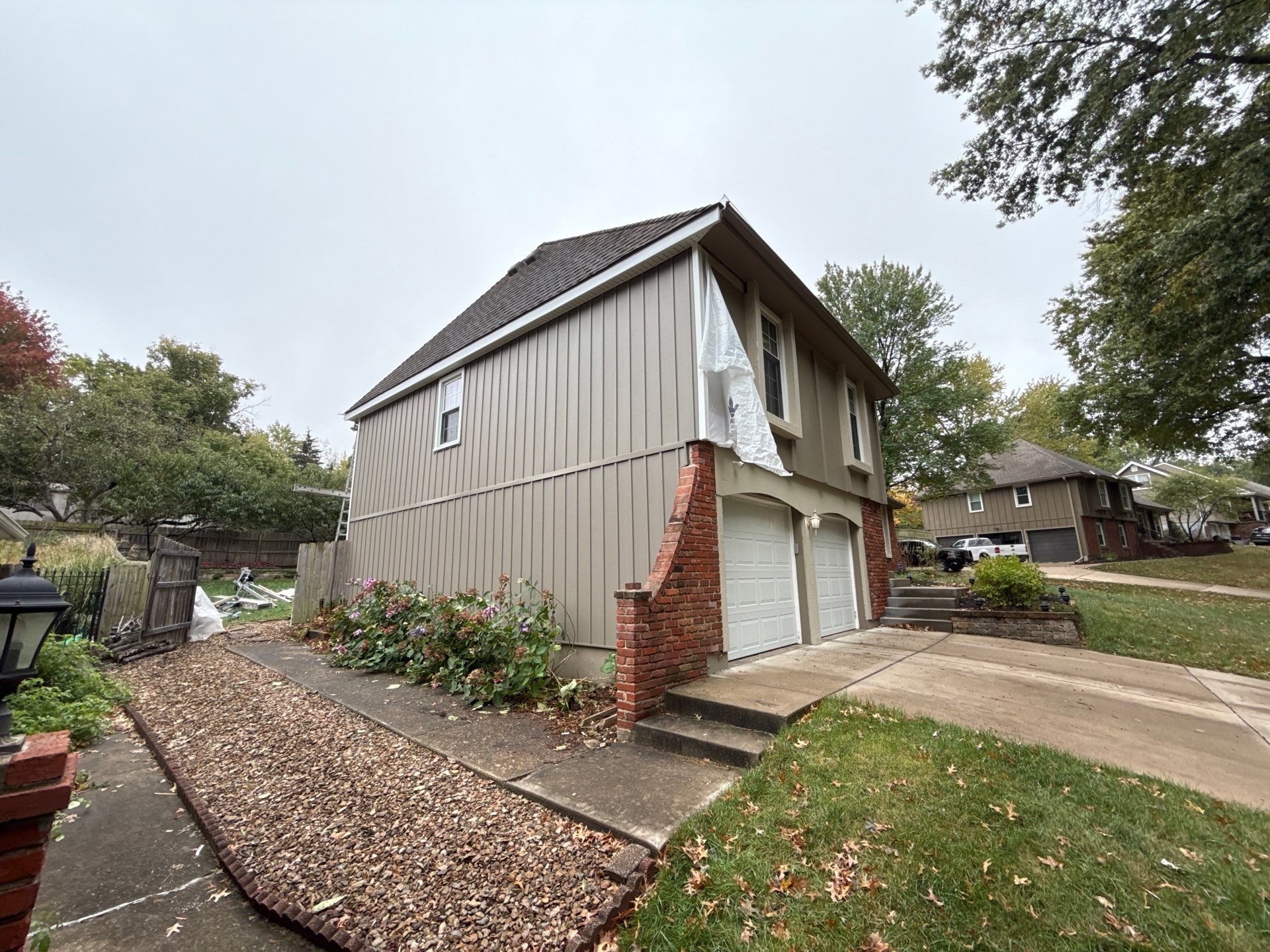 Complete Kansas City Exterior Remodel With IKO Roofing and Craneboard Siding by EEC Windows, Siding & Roofing