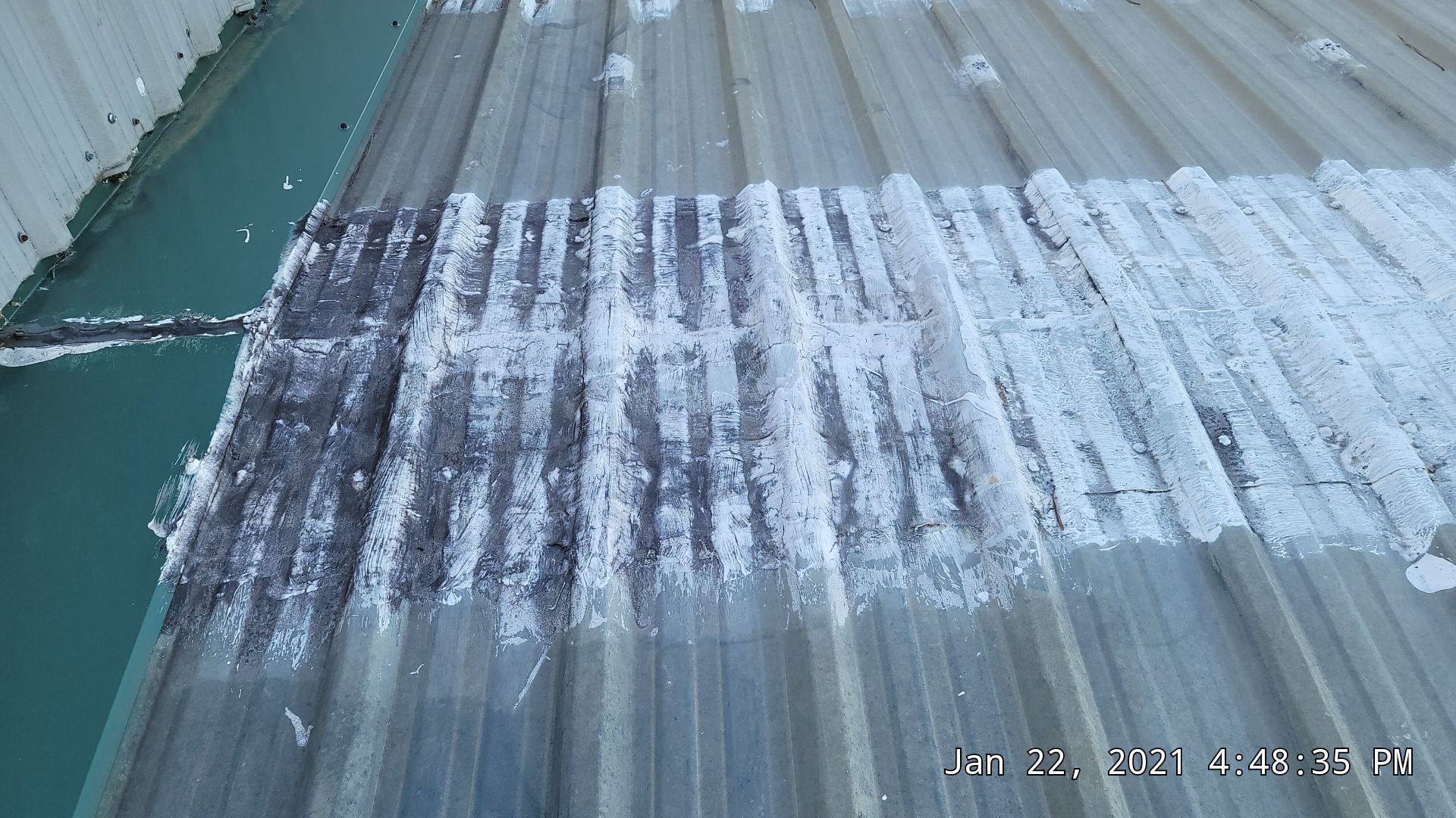 Commercial Roofing Installation using Aldocoat Coatings by Hostetler Roofing