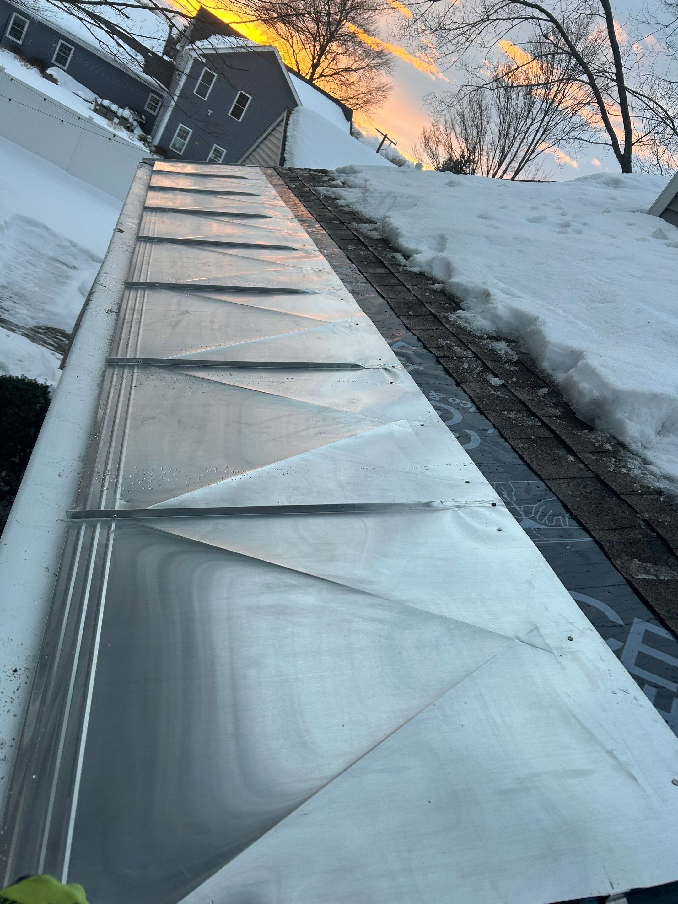 Snow/Ice Belt & Ice Dam Removal Project in Woburn by Mighty Dog Roofing of Greater Middlesex County