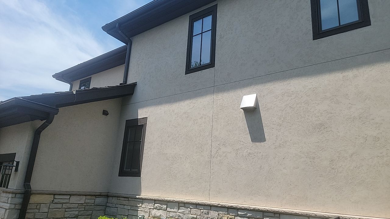 Housewashing  using Algaecide, soft wash soap by Northern Power Washing LLC.