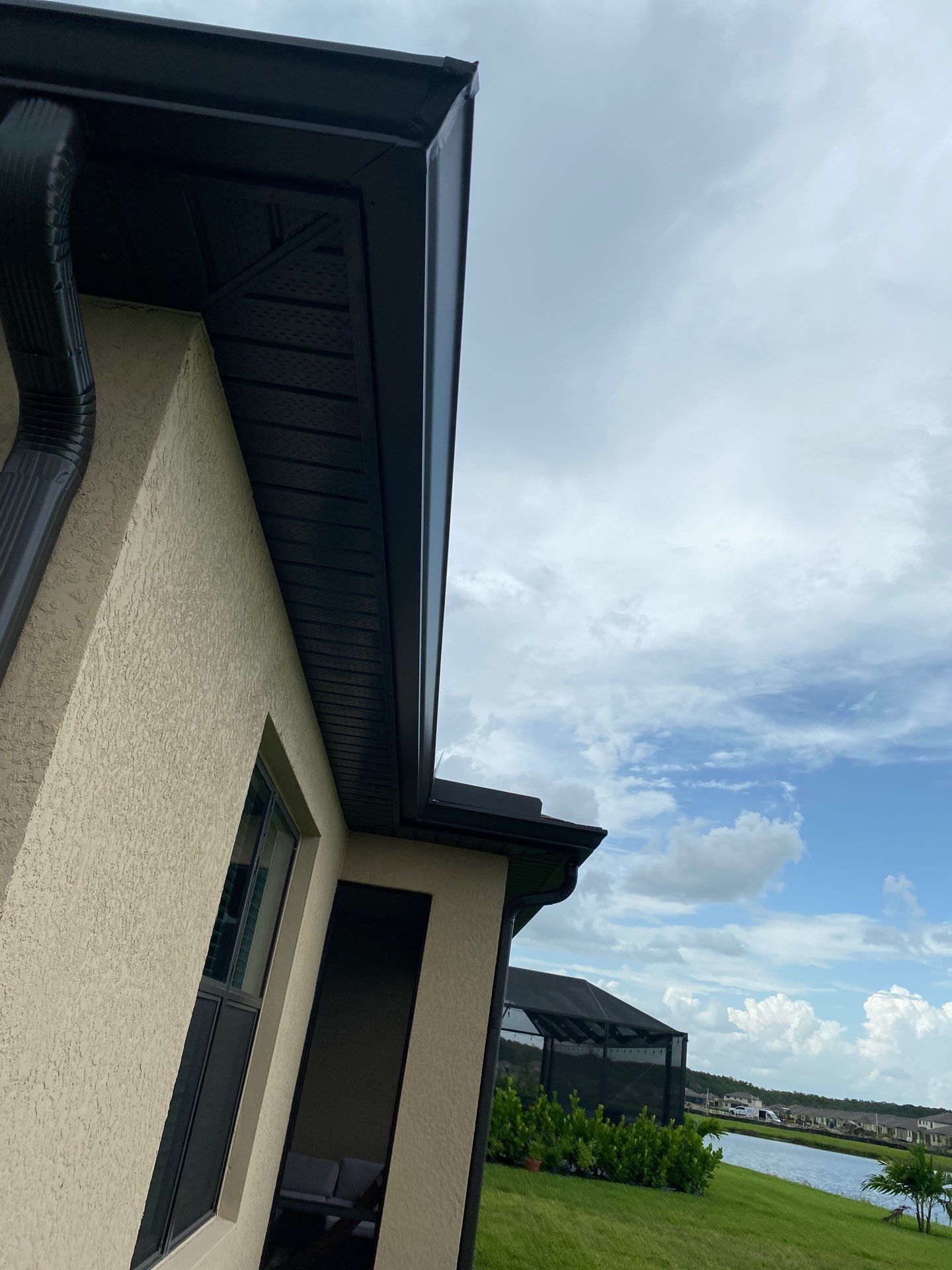 Brown Seamless Gutters for Homes in Fort Myers by Gutter Professors