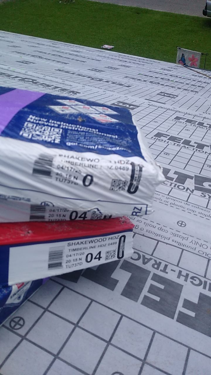 Residential Roofing Installation using Roof Replacement by American Roofing & Construction LLC