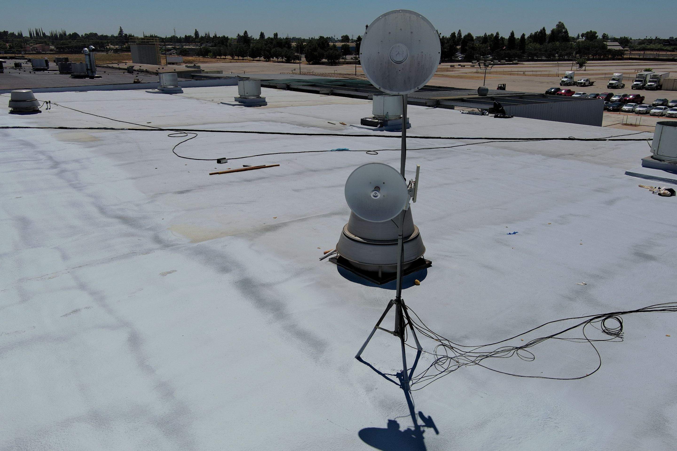 Pro Farms Spray foam roofing project by Straight Edge Roofing Inc