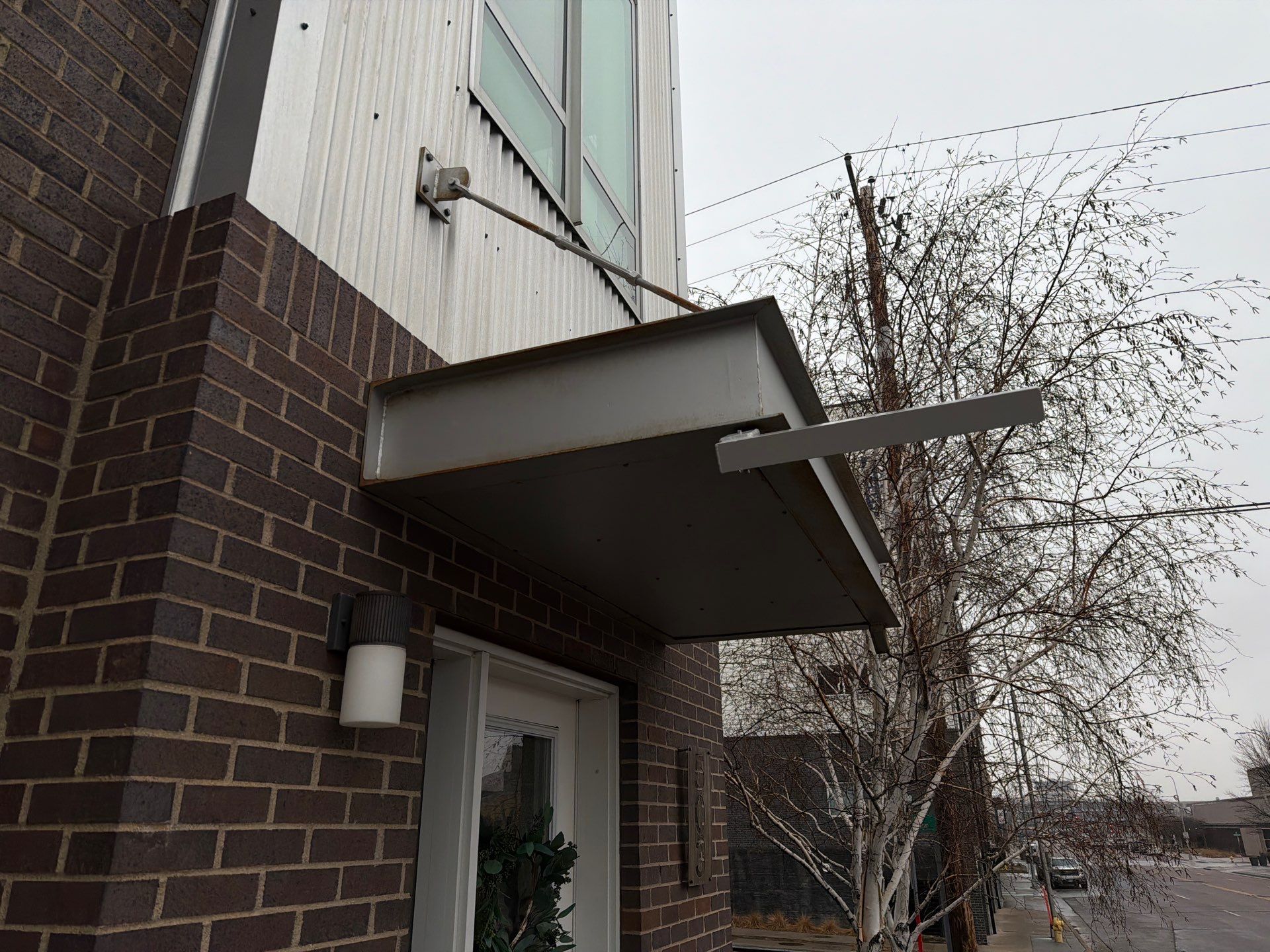 Modern Multi-Unit Exterior Painting and Siding Refresh in Sioux Falls by Select Painting, Coatings & Garage Cabinets