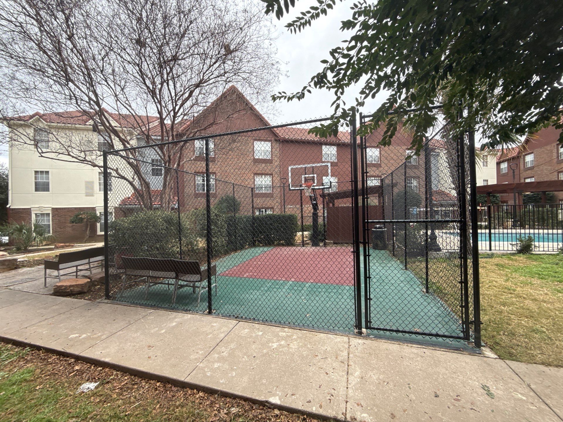 5' Wrought iron fencing w/ 10' vinyl chainlink by Grizzly Fence And Patio