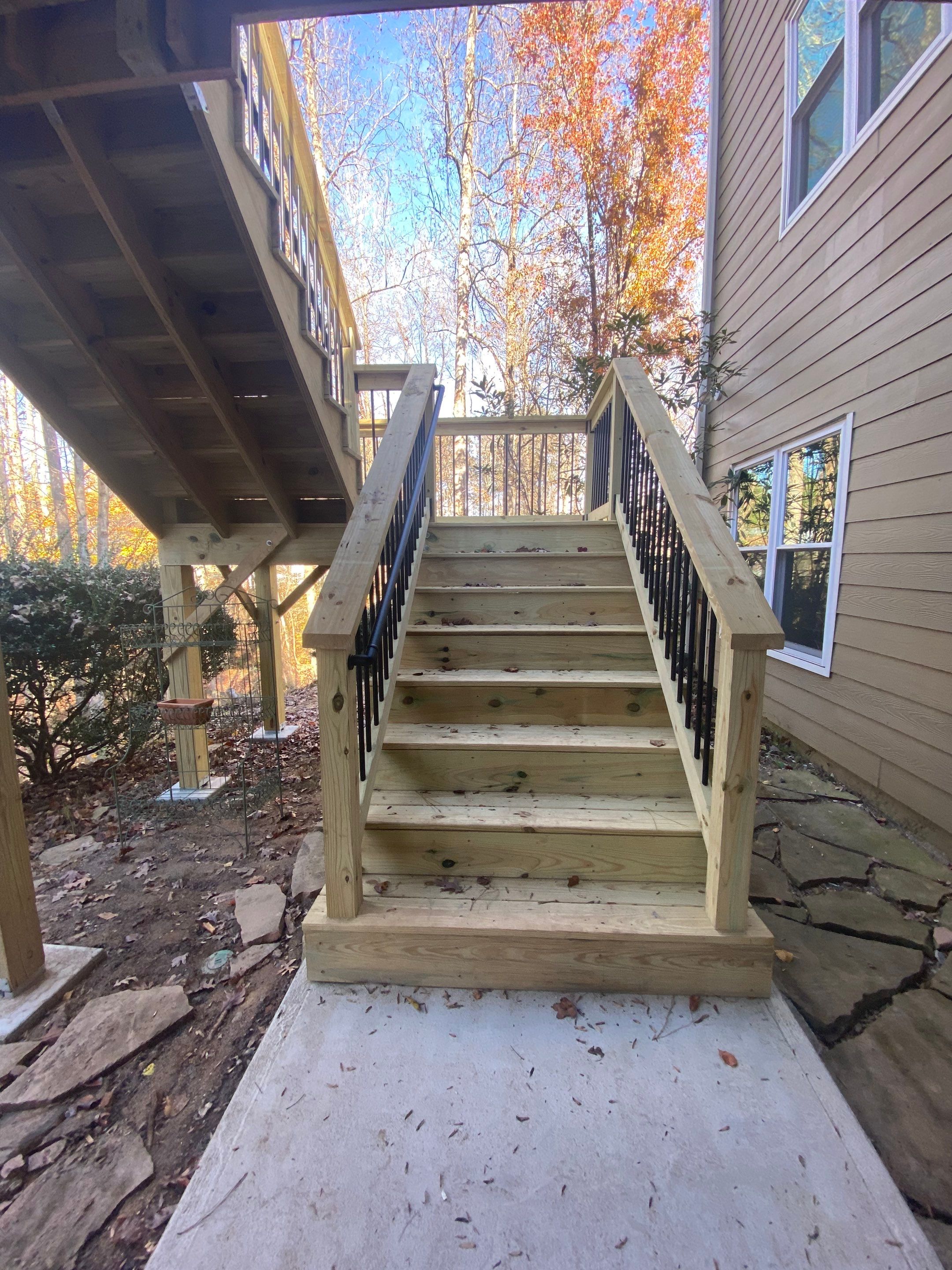 Elevated Wooden Deck and Staircase Construction in Cumming by Swift Home Renovations