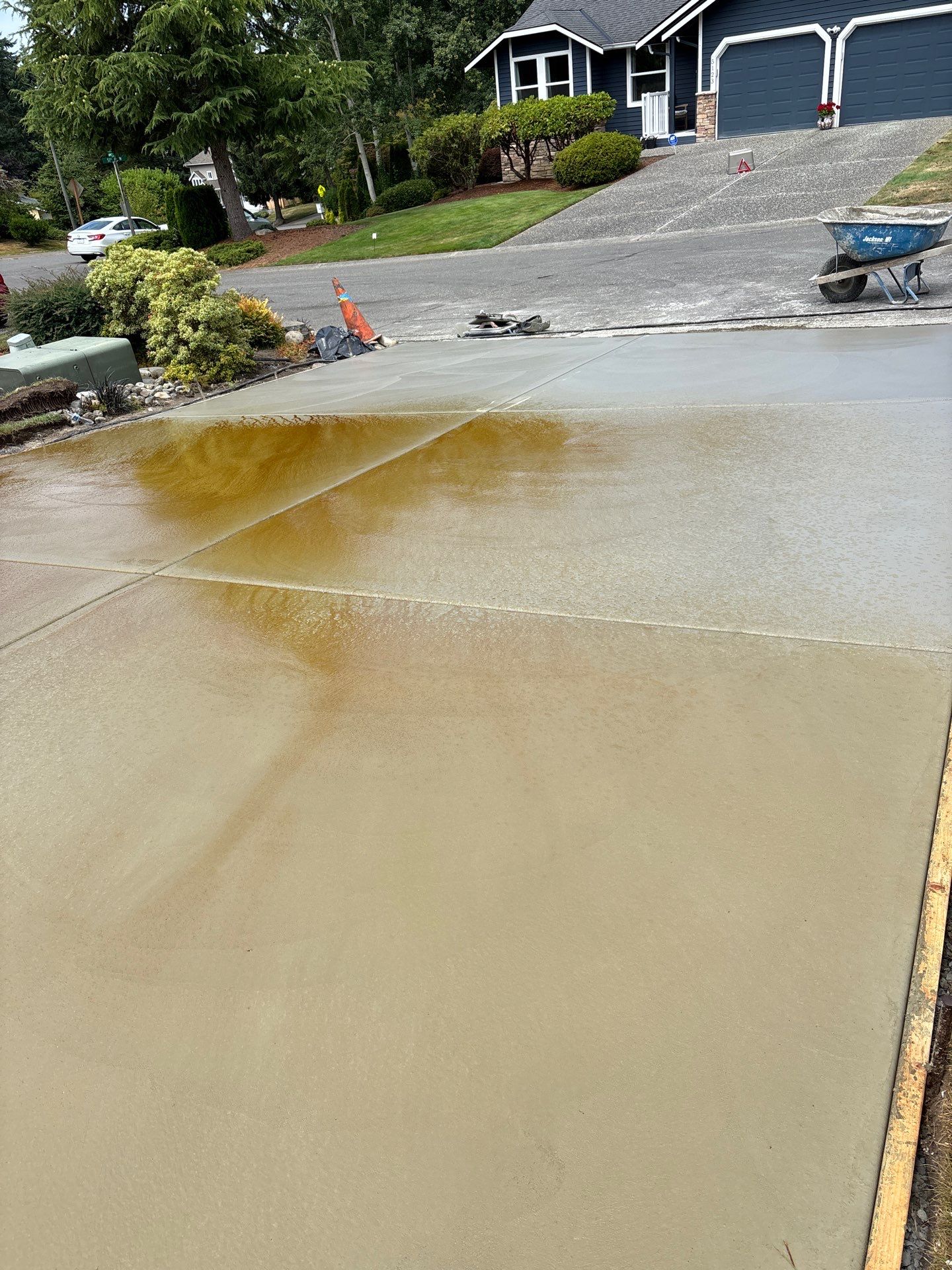 Exposed Aggregate Concrete Driveway Makeover  by Jireh Asphalt & Concrete Inc 