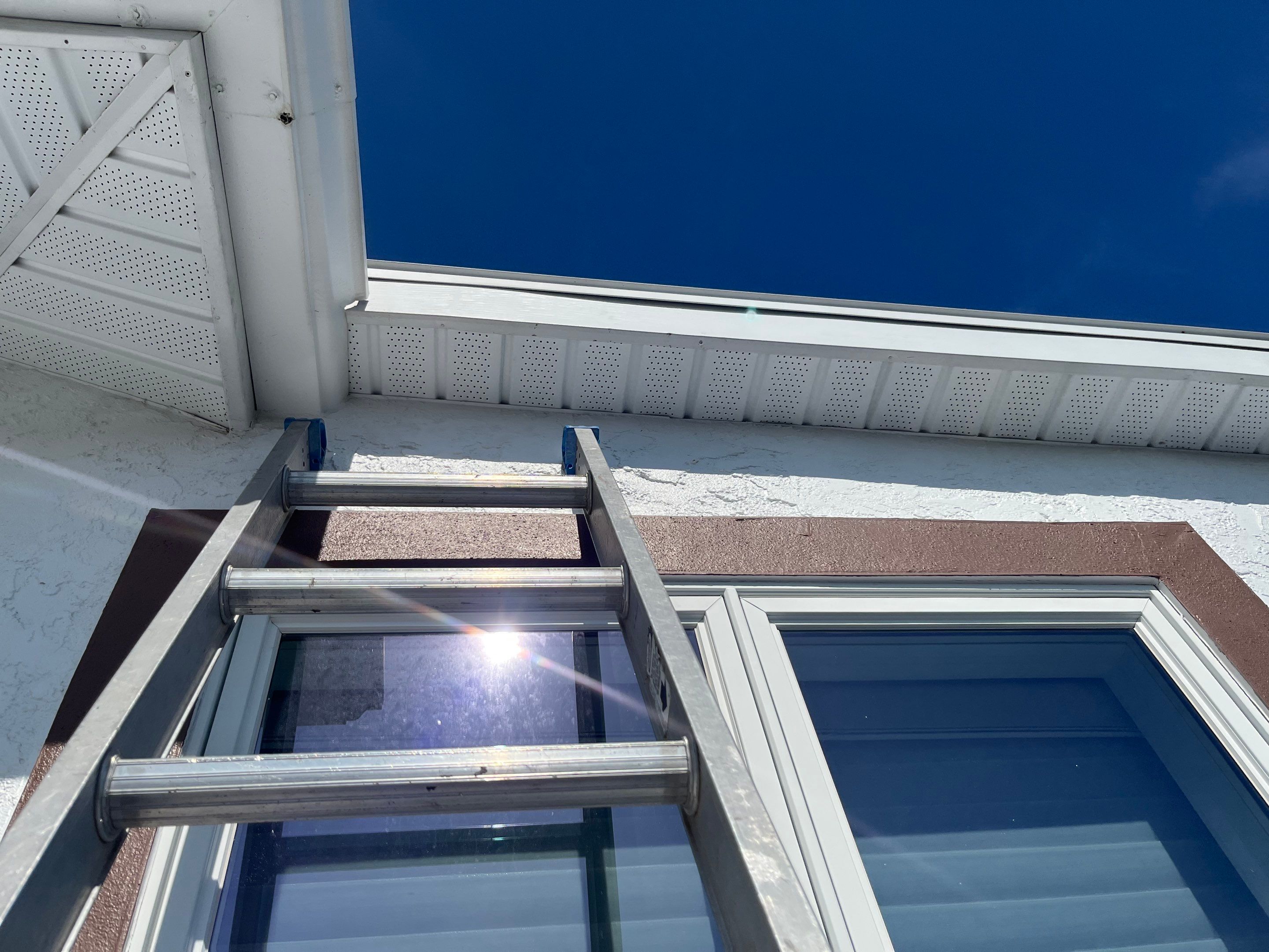 Repainting and Upgrading Gutters in Sarasota FL by Gutter Professors