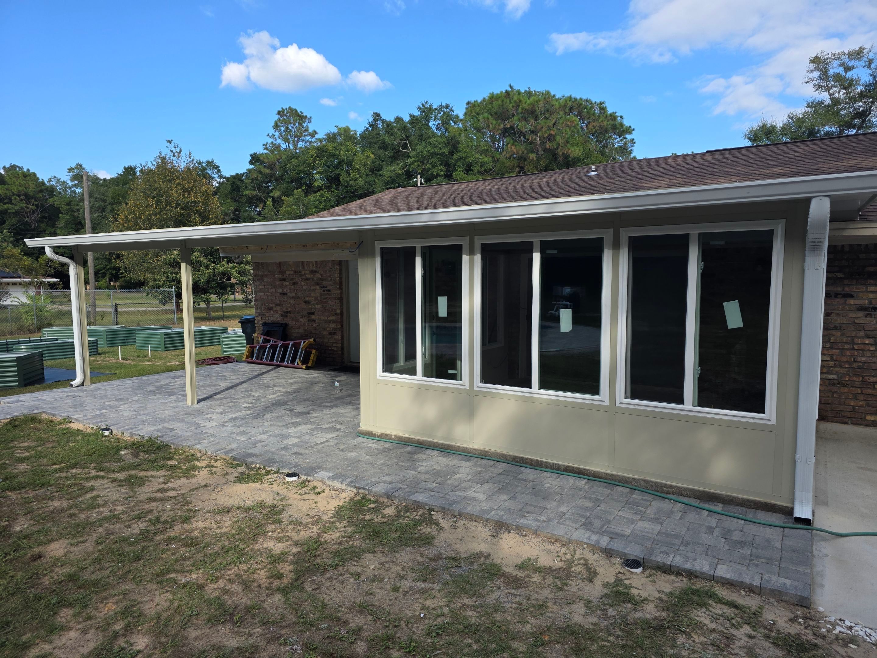 Sunroom Addition and Covered Patio by Titan Sunrooms